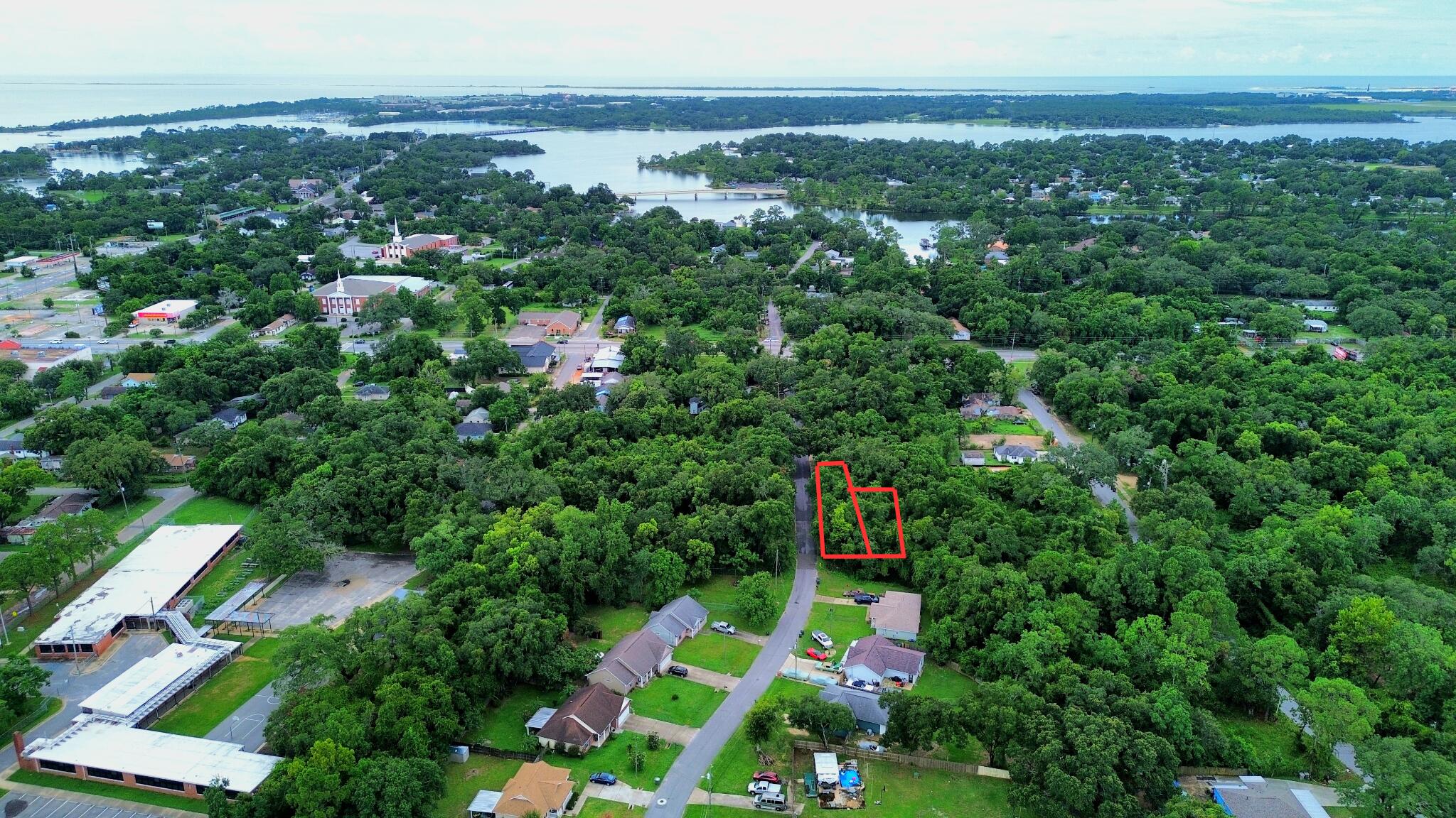 Two adjoining parcels totaling .3416 acres are now available just minutes from the front gate of NAS Pensacola! Located right off Gulf Beach Highway on a partially developed residential street, these lots offer easy access to beaches, shopping, dining, and more. Zoned MDR (Medium Density Residential), this property offers flexibility for a variety of residential uses. The land is not cleared, and tap fees have not been paid--giving you a blank canvas to develop exactly as you wish. Whether you're ready to build your forever home or invest in Pensacola's growing west side, this location combines accessibility with long-term potential.