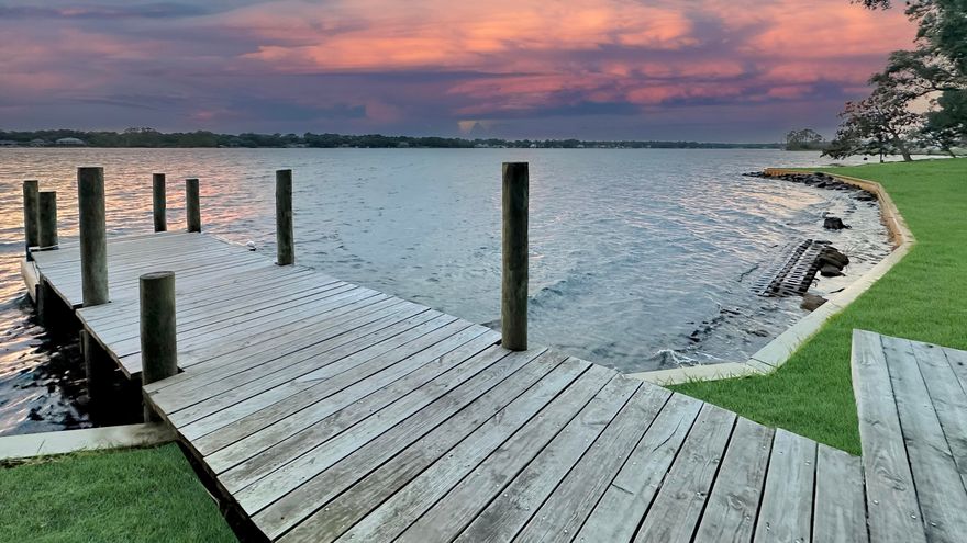 Welcome to 94 Marina Cove Dr, a recently remodeled 3-bedroom, 2.5-bathroom townhome in Bluewater Bay. The spacious living areas are upgraded with new luxury vinyl flooring and plush carpeting. The kitchen features modern appliances and quartz countertops. Updates include recessed LED lighting, outlets, switches, new base boards and fresh paint. There's an extra room attached to the garage that's not counted in the square footage that could serve as a bonus room or a media room/office. HVAC replaced 2022 and water heater 2021. HOA handles all exterior maintenance and repairs ($360/month). Bluewater Bay offers golf, a marina, tennis courts, pools, a clubhouse, nature trails, playgrounds, parks, and amazing schools. Seller is a licensed Realtor. Explore this meticulously maintained townhome