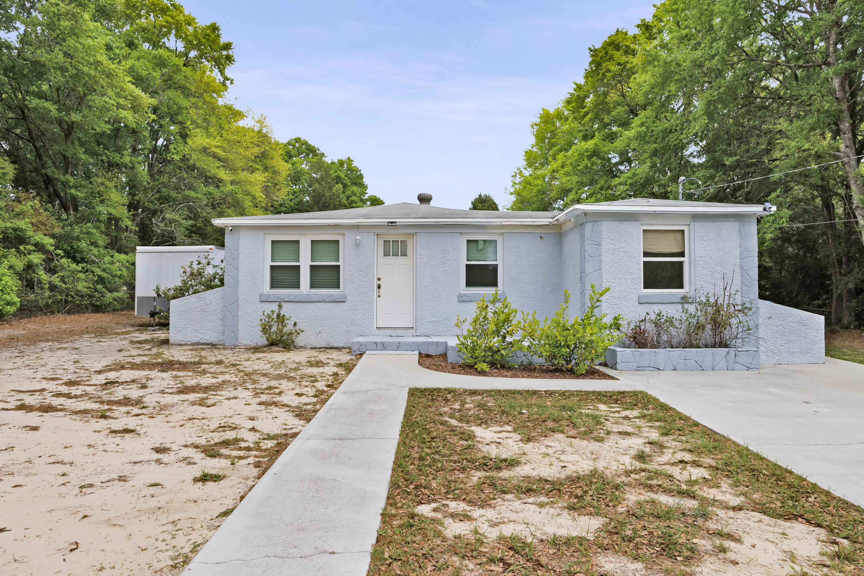 Conveniently located is this move  in readyhome in East Crestview. Carpet almost new, appliances hardly used and new window with high wind rating. Big back yard for play or gardening. Solid block construction makes for efficient heating and cooling.  call today