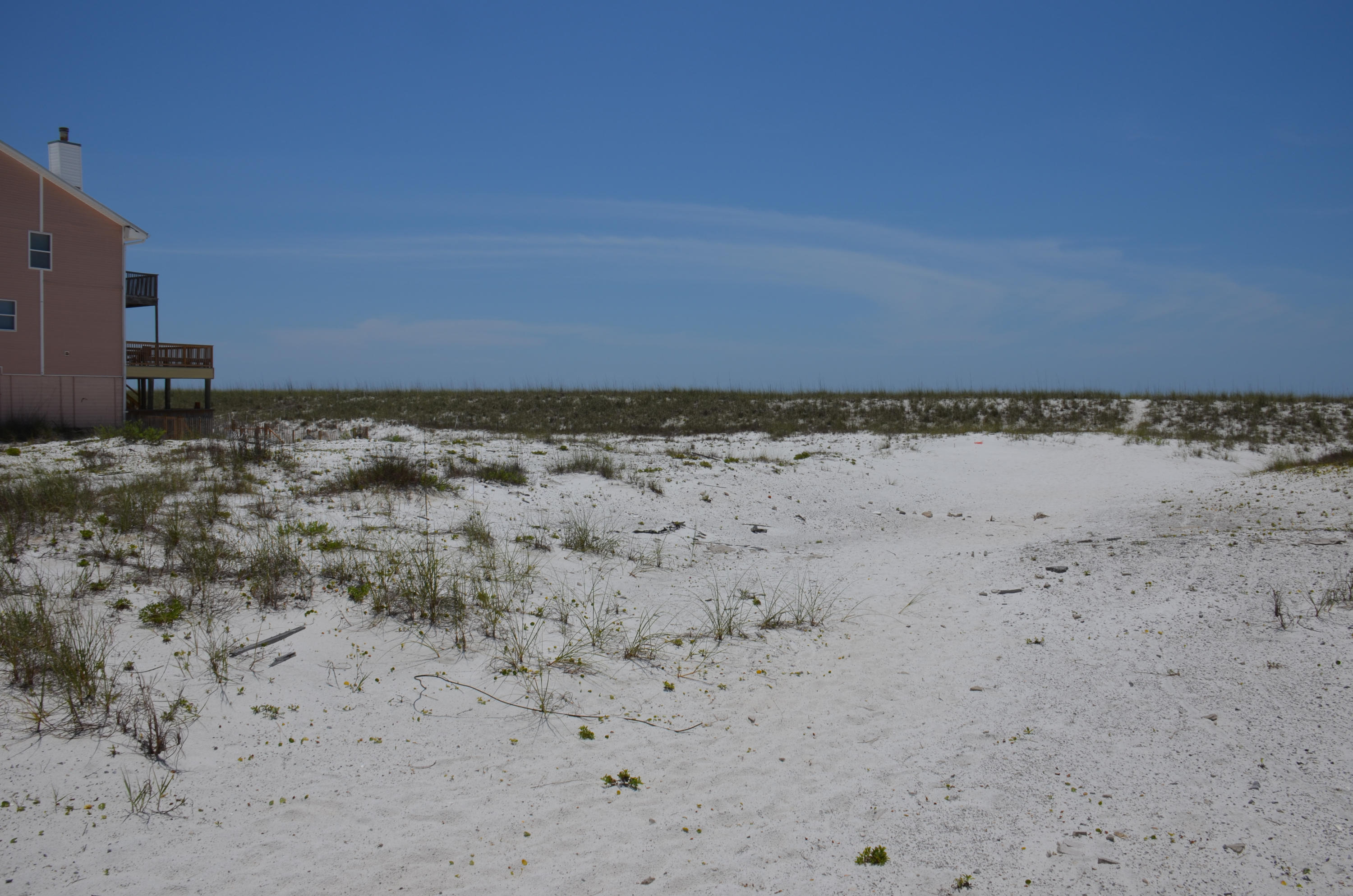 WATERFRONT. 20ft lot on the Gulf of Mexico. A rare opportunity to buy this affordably priced lot and build your dream home on the Gulf of Mexico. Enjoy Panoramic views with direct access to the beach.Navarre Beach is one of the last few places with the old Florida feel with miles of crowd free beaches, miles of bike trails, Navarre Beach pier, Navarre Beach state park and more. Buyer to verify all information to buyers satisfaction including but not limited to lot size, zoning etc.