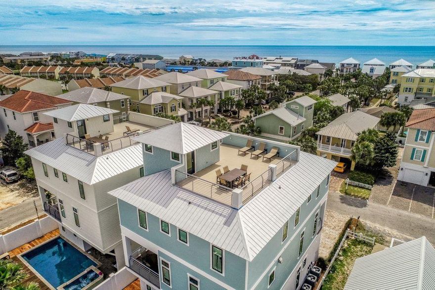 Sleek coastal contemporary design perfectly situated to capture gulf views & masterfully configured providing unparalleled amenities including a Watermark-built private resort style pool area complete with a covered outdoor summer kitchen. This is the ultimate beach house, recently completed in early March 2019 offering excellent income opportunity with +$250,000 in gross projected annual rental income and over $100,000 already on the books for 2019. This home was designed to maximize functionality and finely appointed with chic contemporary finishes while affording optimal comfort & living space.