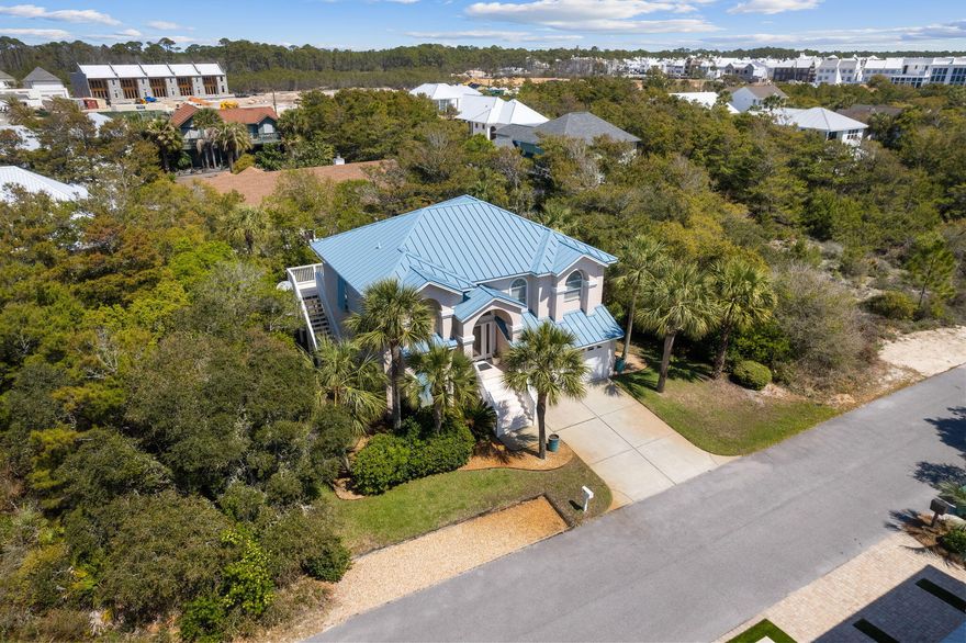 Step into luxury living in the highly sought-after Sandcliffs community, located in one of 30A's few non-rental neighborhoods. Experience unparalleled exclusivity and privacy in this gated community, where the beaches boast low density due to the non-rental status of the area. Imagine enjoying serene walks on the beach with ample space to relax and soak up the sun.Situated just a short walk away from the vibrant and trendy Kaiya, Alys Beach, and Rosemary Beach, this location offers the best of both worlds- the tranquility of a secluded neighborhood with easy access to world-class dining, shopping, and entertainment.This stunning home located at 89 Walton Buena Vista is a rare gem, featuring 3 spacious bedrooms and 3 1/2 luxurious bathrooms with a two-car garage.