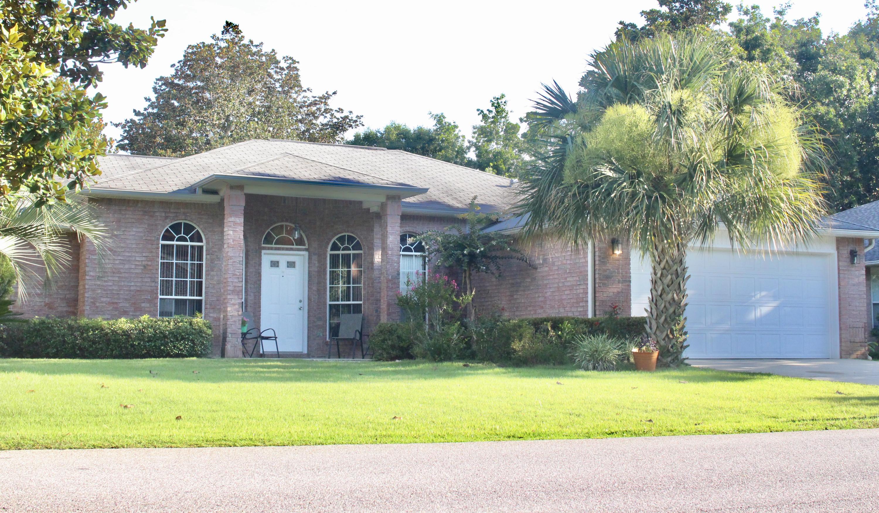 This 3 bedroom 2 bathroom all brick home with a heated screened saltwater swimming pool is exactly what you need on these hot summer days. The kitchen has been upgraded with granite countertops, tile backsplash, and tile flooring. There is wood laminate flooring throughout. Walking in the front door the formal dining room is to your right, just off the kitchen and to your left you will see the office area that can easily convert to a 4th bedroom. The master bathroom has been updated with granite countertops, tile shower, and tile backsplash around the separate garden tub. The bathroom also has his and her walk in closets. The guest bathroom has been updated with granite countertops. Sprinkler system has a separate well to cut down on water bill.