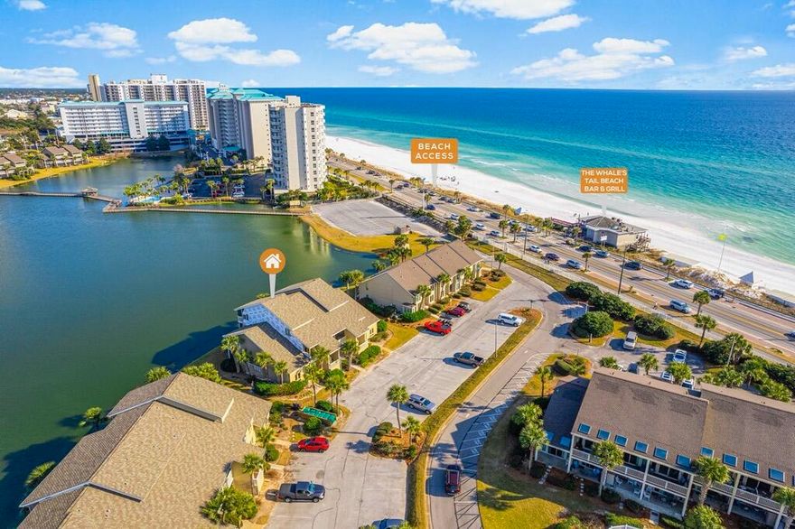 Welcome to Seascape Resort in Miramar Beach! This 2-bedroom, 2-bath condo is steps from the private beach and one of the closest units to the shore in Seascape. Enjoy easy access to 5 resort pools, golf, tennis, pickleball, and the Whale's Tail restaurant just a short walk away. The condo offers stunning views of Stewart Lake from the windows, as well as a private screened porch and patio. Perfect as a primary residence, second home, or vacation rental, it features new appliances (2021 & 2023), new electrical (2023), and a new HVAC (2024). Not on a rental program.