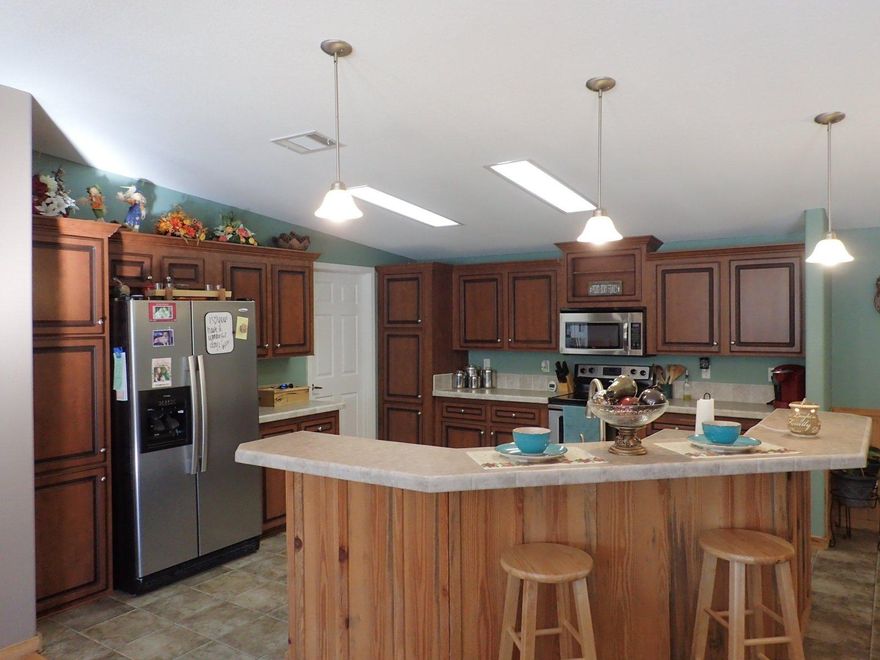 Welcome Horse Lovers! This extremely attractive country home is perfect for the horse enthusiast. Resting on 10.02 acres this beautiful property has been designed for horse owners in mind. Home itself amazing with 3 bedroom 2 bath split bedroom design. Vaulted ceilings in great room and huge kitchen with island and breakfast bar. Master is very large with massive master bath room including garden tub, separate shower and tiled walls. You can't miss all the extra touches the seller added during construction included decorative wood walls, bull nose drywall corners and though home is on a crawlspace all HVAC ducting is in the ceiling vs the flooring. Leading to the large extra bedrooms is an office area. 3 pastures make up this equestrian property. Front pasture is apprx 3/4 acre. Cont...... pasture is approx 2 acres and includes the stalls. Back 3 acres make up the 3rd pasture. All 3 pastures have water ran to each and all have three strand electric braid horse fencing. The barn is 16x40 and has power and water which includes 8x12 tack room, 8x12 chicken coop, and 12x16 equipment shed. Stalls are 12x12 each with an 8ft walking area. Power and water can be found here as well. If you have horses or want horses and need a property that is both amazing to occupy and areas that are move in ready for horses, stop looking, this is it! Call today to schedule your showing.