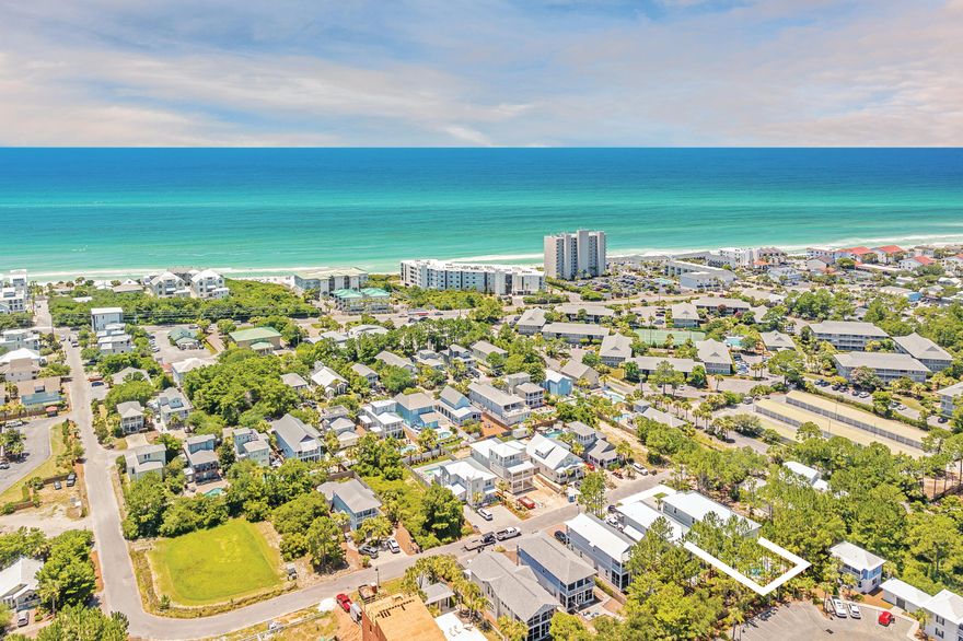 This is your moment to own a slice of 30A paradise at a great price! Tucked in a peaceful Seagrove setting and surrounded by towering pines, this fully furnished, rental-ready retreat is where style, comfort, and investment potential come together. With projected annual rental income of $225,000 and just minutes from the planned Walton County beach access, this is a rare opportunity to secure both lifestyle and long-term value. From the moment you arrive, 37 Sand Dollar Court welcomes you with a wide paver driveway, elegant coastal facade, and breezy front porch. Step inside to find wide-plank hardwood floors, shiplap accents, and a light-filled, open layout that flows effortlessly from room to room. The heart of the home is a designer kitchen fit for the most discerning chef, featuring shaker-style cabinetry, pristine quartz countertops, a dramatic 48" Thermador smart range with dual ovens, and a striking stainless-steel hood. A spacious island invites easy entertaining while glass sliders lead to a screened-in porch designed for year-round enjoyment. With a built-in grill, Naturekast cabinetry, and serene views of the private heated pool and wooded backdrop, this outdoor space is truly an extension of the home.

The first-floor primary suite offers a restful escape with a spa-like bath, while upstairs features a second living area, three spacious guest rooms, including a tranquil second primary suite and a custom bunk room with two queen-over-queen built-ins for extra guests.

Out back, the sun-drenched pool deck is surrounded by privacy fencing and framed by tall pines, offering both seclusion and serenity. Whether it's morning coffee on the porch, sunny afternoons by the pool, or evening dinners under the stars, every moment here feels like vacation.

Located near Seaside, WaterColor, Old Seagrove, and a growing collection of shops and restaurants, 37 Sand Dollar Court is more than a home, it's a lifestyle. 

This is coastal living at its finest, and now is the perfect time to make it yours. Buyer to verify all information and dimensions. Listing agent has an interest in the property. 