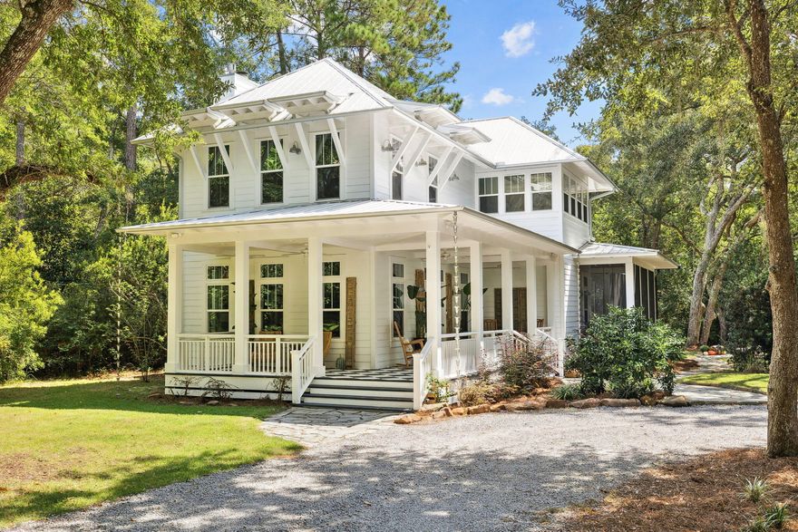 Welcome to 207 Bay Trace, a freshly updated coastal sanctuary nestled beneath a canopy of mature oaks in the exclusive community of The Woods in Santa Rosa Beach. This beautifully maintained 3-bedroom, 3.5-bath custom home sits on nearly an acre of wooded privacy and has just been completely repainted inside and out, offering a crisp, modern feel throughout. The 2,640-square-foot layout is both elegant and livable, featuring hardwood and tile flooring, a chef's kitchen with granite countertops and stainless steel appliances, an inviting fireplace, and an open-concept design ideal for entertaining or quiet family time. Step outside to enjoy a newly added resort-style pool, and a sprawling wrap-around porch perfect for morning coffee or evening cocktails. The grounds are a true retreat, with a fire pit, mature landscaping, and ample space to relax or garden in peace. A detached carport adds convenience, while the nearby community dock offers access to stunning bay views and serene sunsets not to mention great fishing. Located just two miles from the sugar-white sands of 30A and minutes from Seaside, 207 Bay Trace blends timeless Southern charm with fresh modern updates in one of Santa Rosa Beach's most coveted neighborhoods.