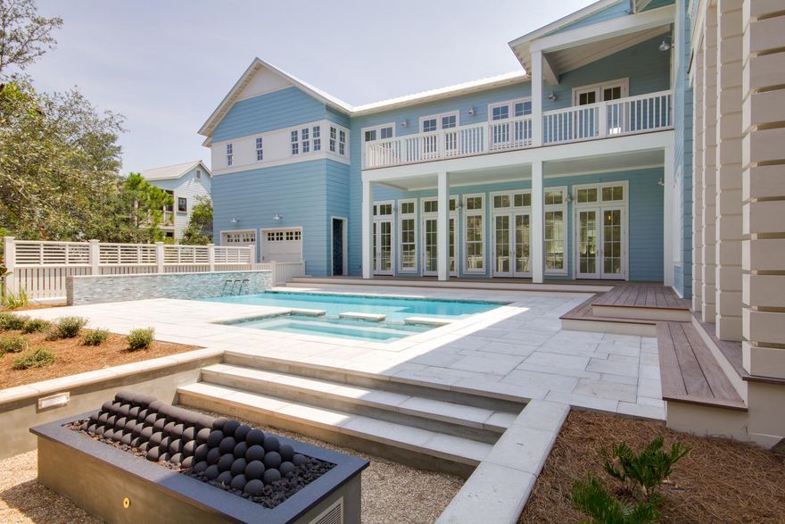 Outstanding coastal retreat with private swimming pool from Romair Homes now under construction in Phase II of the WaterColor community with estimated June 2017 completion. With 4,690 sq.ft., five bedrooms, a two-car garage and ample outdoor living spaces, this spacious home will comfortably host large groups of family and friends. The first story offers airy 12' ceilings throughout with an open concept living and dining area leading to a fully equipped kitchen. A luxurious master suite with a separate sitting area and private porch is located on the second story along with four guest rooms with ensuite bathrooms. The third story offers a large secondary living area with vaulted ceilings, a bunk room and a full bathroom. Relax by the private swimming pool and spa after spending a day