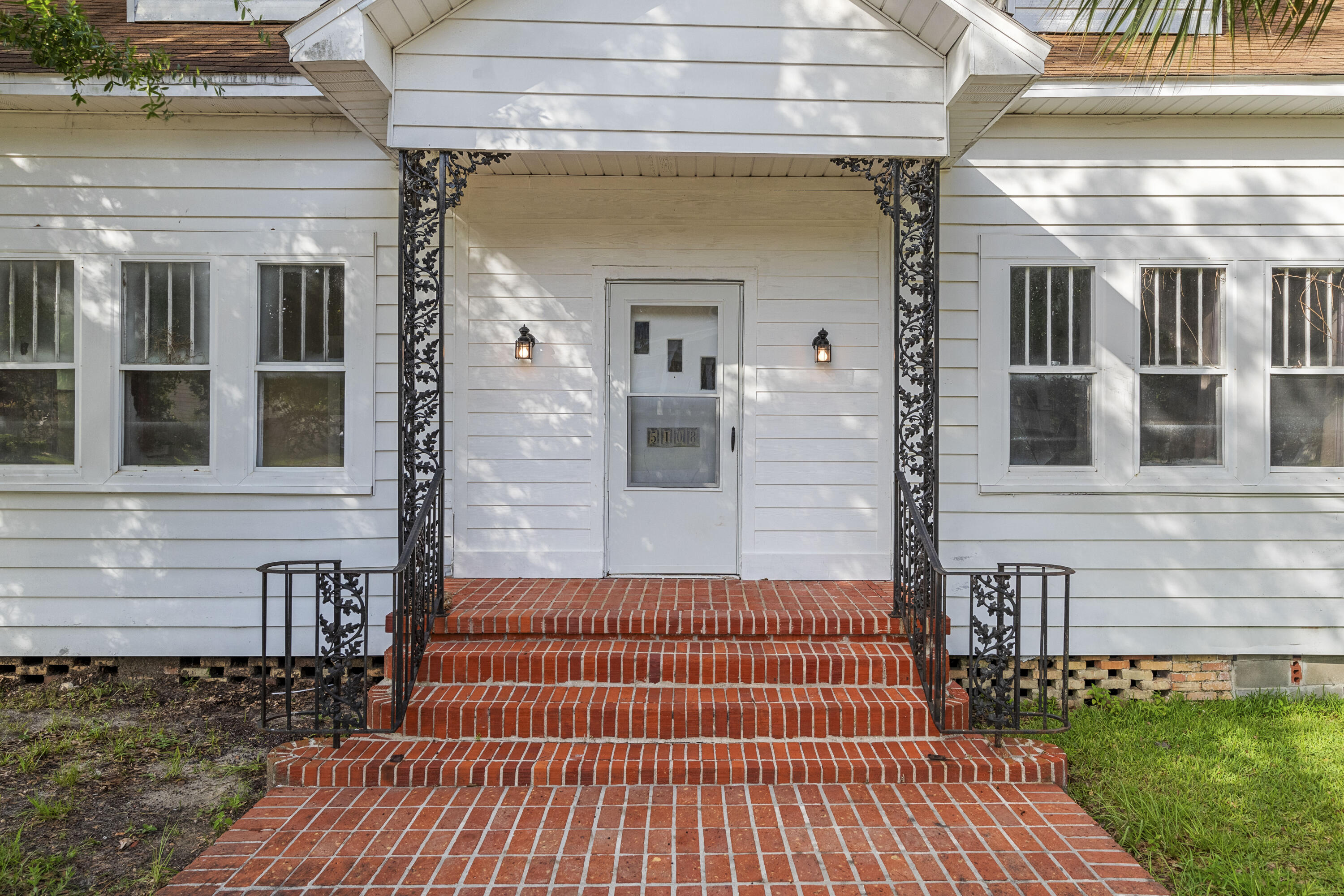 Step back in time while enjoying modern comforts and luxury! This exceptional home, built in the early 1900s, is bursting with unique character and historic charm that you won't find anywhere else. Situated on a generous .628-acre lot, the property offers plenty of outdoor space surrounded by nature, perfect for gardening, entertaining, or quiet relaxation. Inside, you'll be greeted by an open floor plan designed for today's lifestyle, seamlessly connecting living, dining, and kitchen areas to create a spacious and inviting environment. Soaring 12-foot ceilings enhance the sense of space and allow abundant natural light to pour in through large windows, highlighting original architectural details, this blend of vintage character with bright, airy living spaces makes the home timeless!