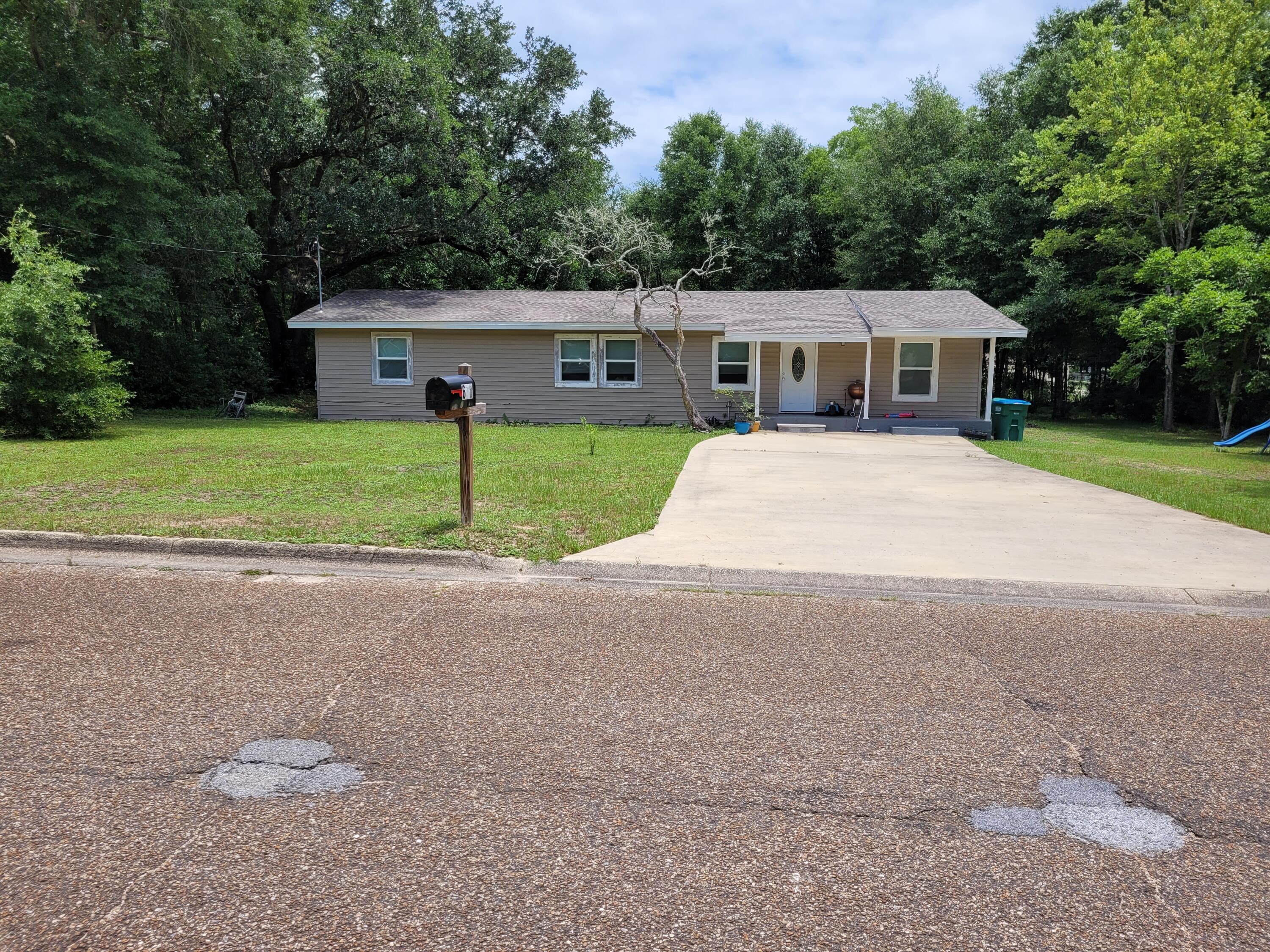 This home was renovated about 3 years ago and sets on approximately 1/2 acre that borders Lee Avenue on the front and E Edney on the back. Huge back yard. It is now a 4 bedroom 2 bath home. Duke Field and 77th Special Forces is approximately 11 miles, Eglin AFB is approximately 23 miles awayand Hurlburt Field approximately33 miles. The roof, windows, HVAC and most siding were changed out during the renovation. A new driveway and parking pad were added as well. It includes two full baths and the main bedroom has double closets.