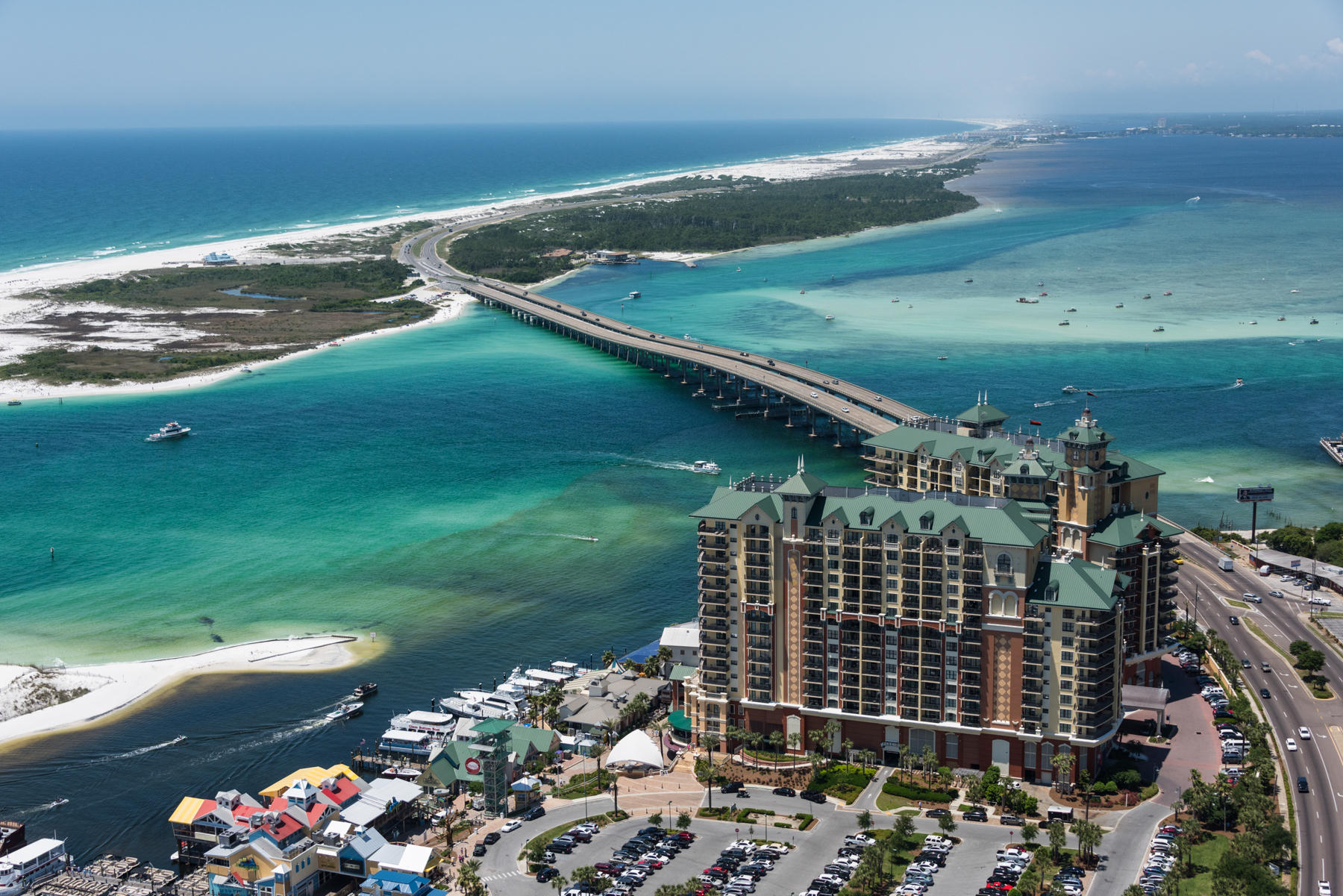 Make over complete!!!! LOOK AT THAT VIEW! Perfectly located on the Harbor in Destin, The Emerald Grande has become the heart of the luckiest fishing village. Make sure to scroll through all the listing photos to see just how perfectly located you can be. It does not get any better than this with views of the Harbor, Gulf of Mexico and the Bay! Not to mention the proximity of everything there is to do along the Harbor and it's surrounding community. You'll never have to leave the property with The Grande's indulgent amenities including heated pools, a luxury spa, a fully equipped gym and sauna, a delicious onsite restaurant that provides 24 hour room service and much much more!