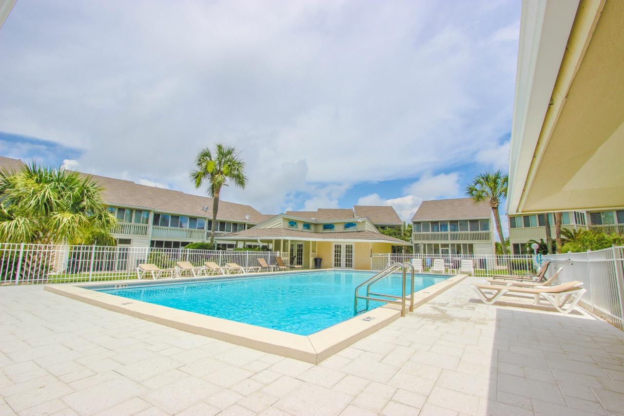This home is the very essence of elegance among a peaceful setting. Aptly positioned a flip-flop walk to the beach and Pompano Joe's Seafood House, this spacious two-story townhome is ideally located for your beach vacation.Misty Cove offers two bedrooms, two and a half baths, a large living area and screened in patio off the main room. The community pool is conveniently located directly outside your back door.With slate tile downstairs, and hardwood upstairs you will find the finishes of this townhouse quite beautiful, and practical.You certainly won't miss a beat on a rainy day, as this home features a 70'' flat screen Smart TV for your viewing pleasure with the lightning speed free wifi. The master bedroom offers a tranquil getaway, with a luxurious king sized bed, 55'' TV,