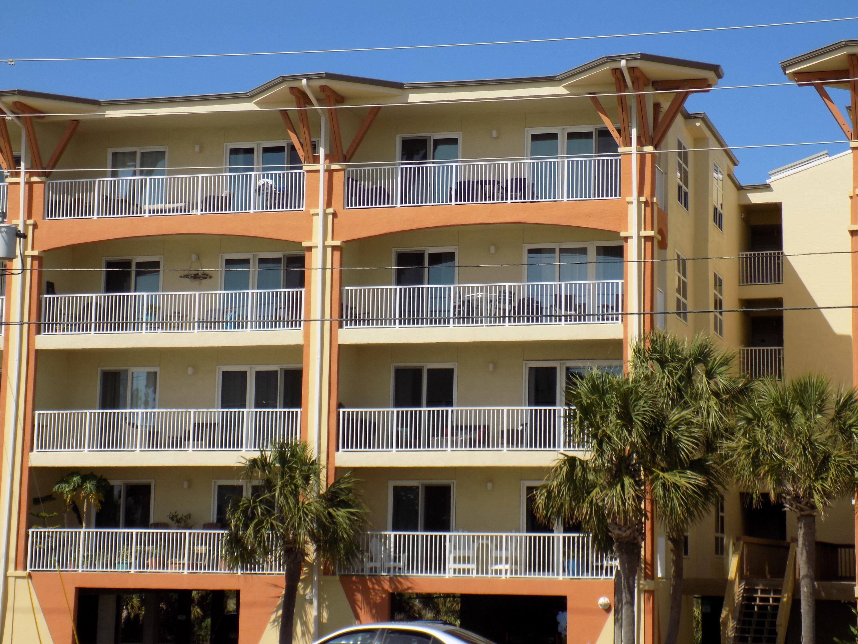 AMAZING WATER VIEWS from this 3 BD, 2 BA condo at Summerhouse! This is a corner unit with side windows which bring in amazing light. The view & beautiful furnishings will capture you as soon as you walk inside! This condo is on the same floor as the pool & sauna. Go one floor down and you are steps to the beach. The gorgeous kitchen was completely remodeled after the hurricane - new cabinets & quartz countertops with a quartz backsplash & stainless GE appliances. There is new paint & luxury vinyl throughout. This unit is being sold furnished with a few exclusions. The living room & master bedroom have beautiful gulf views & the remaining bedrooms have canal views. Summerhouse features a heated pool, hot tub, sauna, grill area, & covered parking with 1 assigned parking space & extra parking