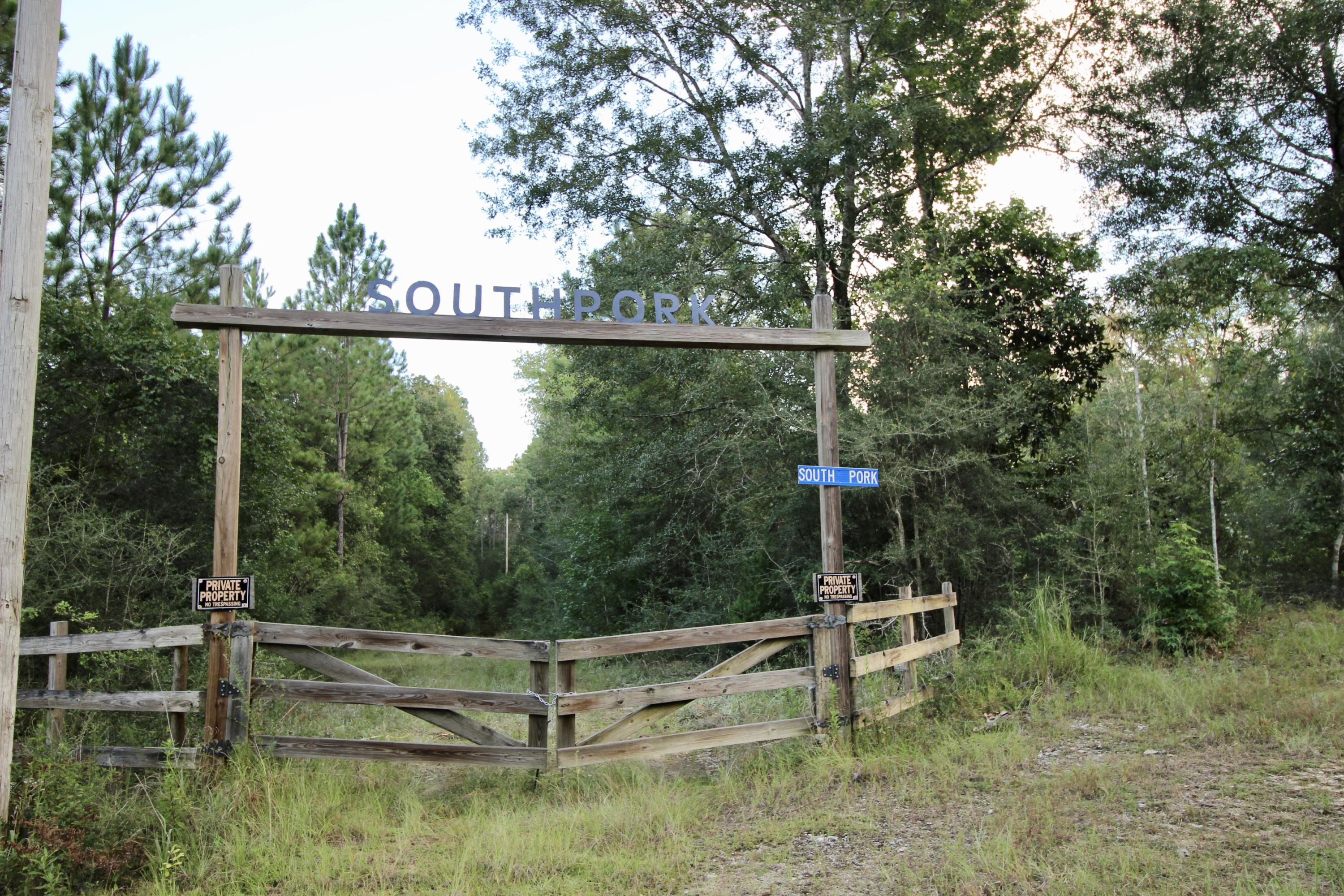 Ideal location, just outside of town past Chautauqua Rehab Center, with a total of 11.7 wooded acres! Build a private oasis in the woods. There is an old barn with a loft on the far northeast corner that at one time had electric. Does need work but has some beautiful old barn wood. Both survey and wetlands study already done for you! See attached documents. Appx 3 acres of uplands laid out in such a way that you can still build or put a manufactured home. The surrounding wetlands are a perfect attractor of wildlife and game too! Acreage this size, on a paved road, this close to town, doesn't come along very often!