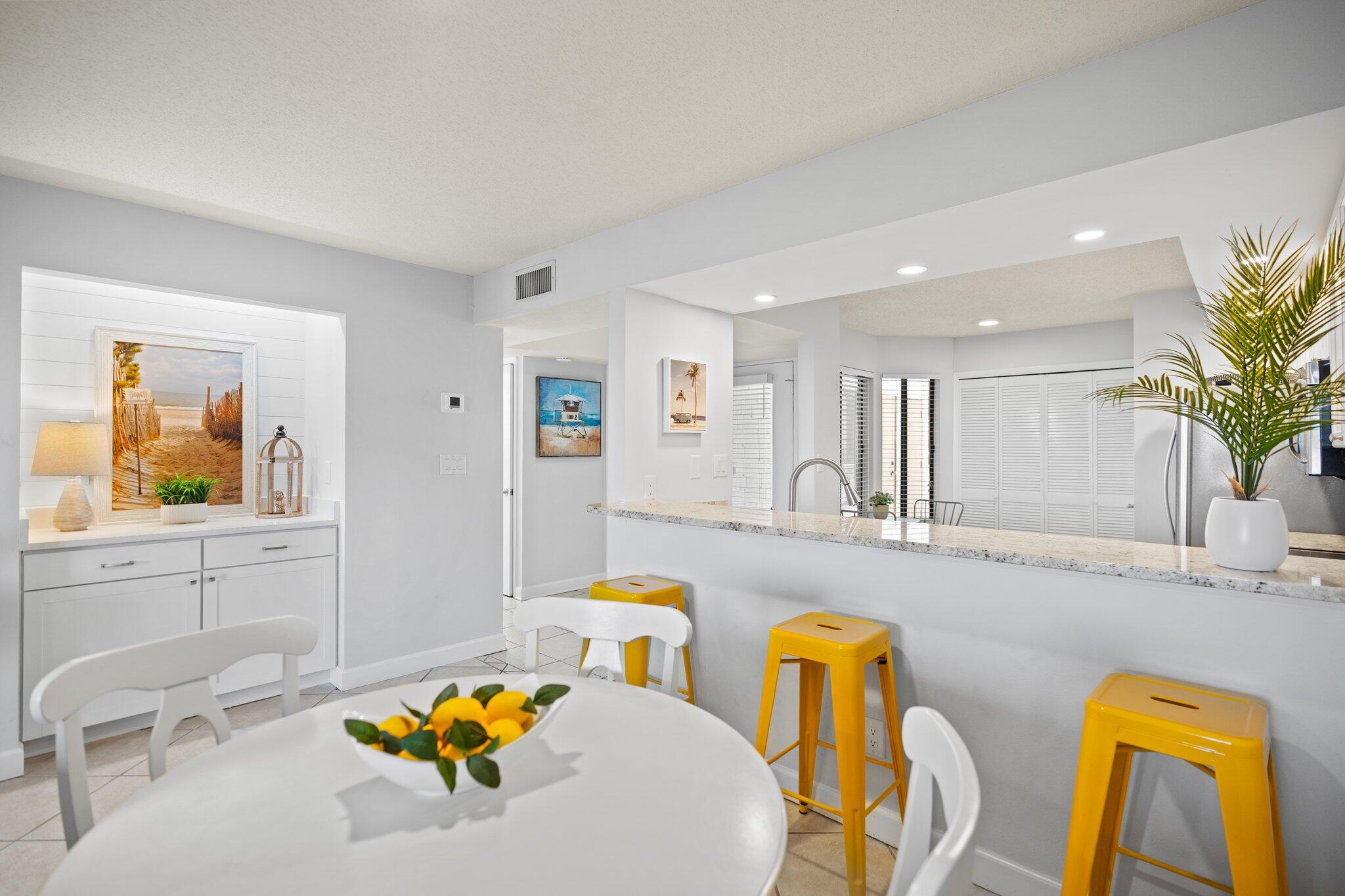 Enjoy this single story, coveted end unit condo with beautiful views of Jolee Island, Choctawhatchee Bay and Baytowne Marina from your screened porch. Heron Walk is undergoing a beautiful transformation with a nautical/coastal palette on the exterior. Inside you will enjoy the recently remodeled bathrooms redone with one oversized walk-in shower and the other tub surround refreshed. Shiplap accent walls, recessed lighting installed in kitchen, all outlets replaced, all interior walls painted. Plenty of storage with TWO owner's closets (one outside and one inside), walk in closets in both bedrooms, a linen closet and a pantry in the kitchen. Being offered fully furnished, rental ready with a golf cart at the curb! Excellent rental potential. Professional photos coming this week! Sandestin Golf and Beach Resort features more than seven miles of beaches and pristine bay front, four championship golf courses, 15 world-class tennis courts, pickleball courts, 108 catch and release ponds stocked with bass (no fishing license required), a 226-slip marina, a fitness center, spa and celebrity chef dining. Shop, dine and play at the charming pedestrian village, The Village of Baytowne Wharf and more. Inside the gates of the resort, residents of the 72 distinctly different neighborhoods enjoy a balanced lifestyle of high-class living, spanning 2,400 acres from the beach to the bay. There are just over 4600 properties within the gates which offer 24 hrs./day gated security. Everything within the gates of the resort is accessible by golf cart or bicycle. The entire resort is interconnected by miles of pedestrian, bike and golf cart paths that weave through groves of live oaks, meandering past natural lagoons, fountains, man-made lakes, and meticulously landscaped fairways.
Just beyond the gates, Grand Blvd with its weekly farmers market, varied events and superb section of dining and shopping is readily accessible by golf cart. The Market Shops, on the south side of highway 98, boasting more dining and shopping choices, is easily accessible utilizing the tunnel beneath Hwy 98