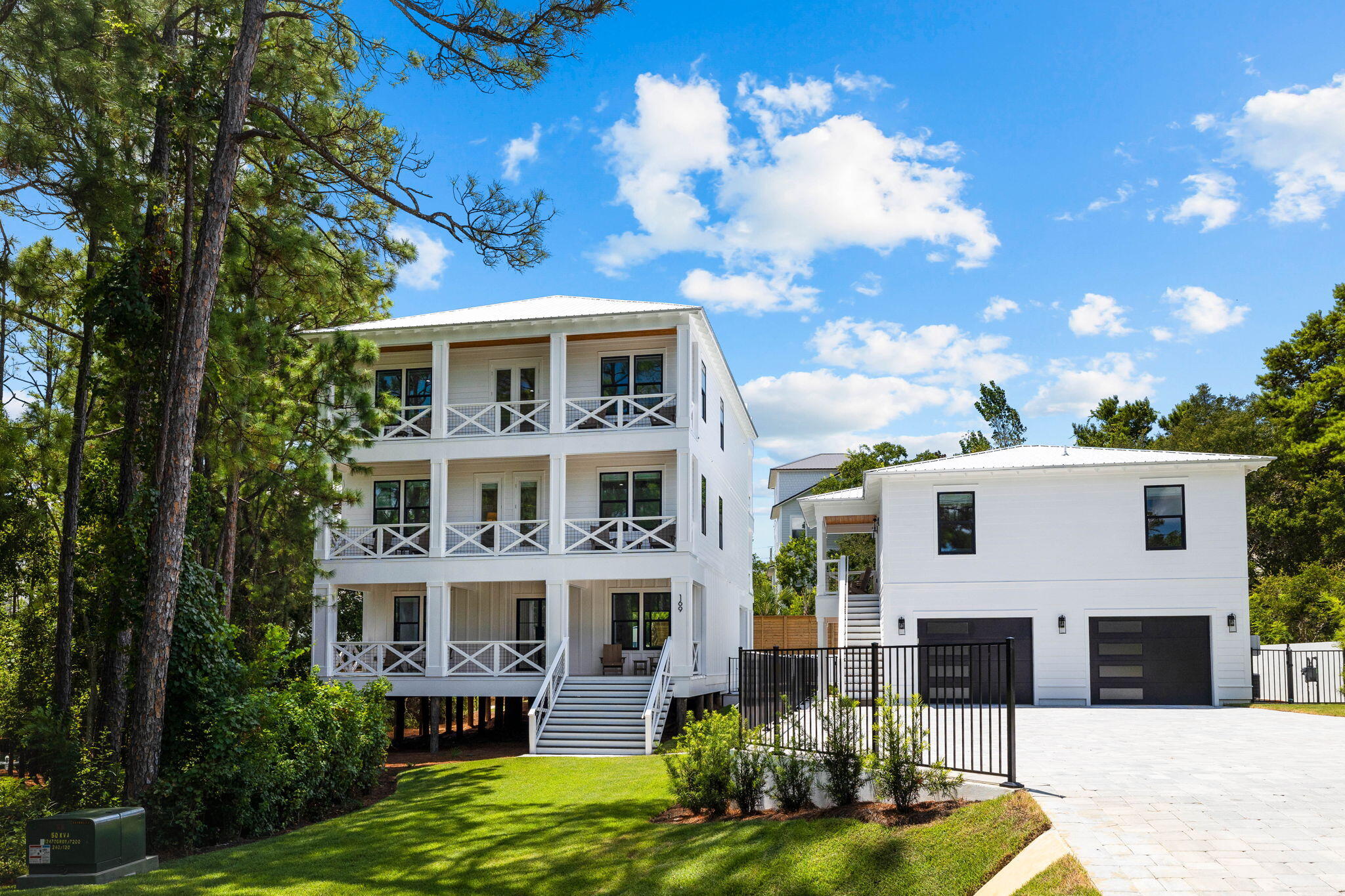 Welcome to 169 Baird Road, a newly constructed luxury retreat in the heart of Santa Rosa Beach.  Accommodating up to 34 guests, this turn-key estate is perfect for large families or as a lucrative vacation rental, with projected annual income of $452,655 making for an estimated 13.5% coc return. This expansive property, situated on a double lot, offers an unparalleled coastal living experience with 8 bedrooms and 9 bathrooms in the main house, plus a separate 2-bedroom, 2-bathroom carriage house. The centerpiece of the outdoor space is a massive resort-style swimming pool featuring a hot tub and waterfall, complemented by a fully equipped outdoor kitchen and dining area. Inside, the chef's kitchen boasts a huge quartz island, 42-inch Thermador range, and separate full-size refrigerator and freezer. Additional amenities include marble-tiled bathrooms, an elevator, wet bar, custom-built bunk rooms, and a first-floor entertainment area perfect for a shuffleboard table. Enjoy Gulf views from the rooftop deck or take a short walk to two nearby beach accesses. With its spacious 2-car garage, ample parking, professional landscaping, and proximity to local hotspots like Stinky's Fish Camp, this property offers the perfect blend of luxury, privacy, and convenience. Reach out to schedule your private showing!