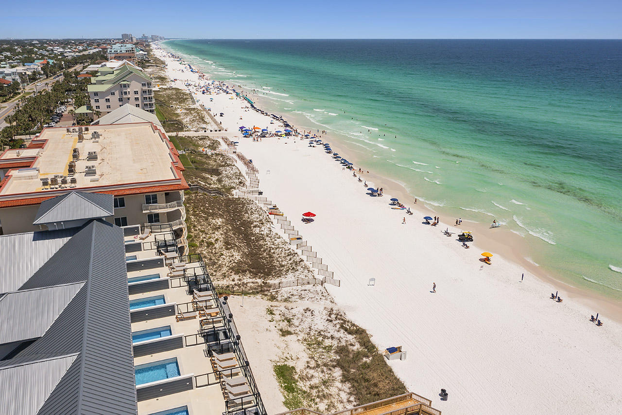 Destin's newest  luxury beachfront project. Only 10 townhomes, each with a private pool. Completed and introduced to the rental market in late March 2021, Unit will top $200K in gross rental income with heavy owner usage. Rental income for 2022 is projected to top $330K. With private beach access, luxurious in-unit amenities, elegant design, and a premier location in Crystal Beach, Henderson Beach Villas sets a new trend in sophisticated coastal lifestyles on the Emerald Coast. Each villa is equipped with a private movie theatre, a rooftop gunite pool, 4 floors of outdoor space, and an in-unit elevator. Professionally designed by Duce & Co, this 3,160-sqft, 6-bedroom villa features 4 floors of luxurious interiors with 10' first-floor ceilings, and high-impact retractable glass sliders.