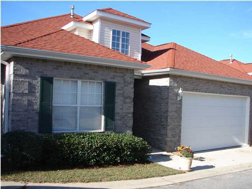 If you are looking for the care free life style, this is the home for you. All brick home, custom built in 2004 by McDorman Construction within the gated community of Magnolia Plantation is Mediterranean Village at Bluewater Bay. The kitchen has Kenmore appliances including a stove with gas burners & electric oven and warming tray, refrigerator with ice-maker, dishwasher, built-in microwave, under counter lighting and plenty of cabinets. The countertops and breakfast bar are solid surface which is carefree. The Living Room features soaring ceilings (15ft), recessed lighting, gas fireplace surrounded by ceramic tile with a large mantelpiece, and double french doors that lead to the deck out back. The Master Bedroom has a extra large walk-in closet, wall to wall carpeting and crown