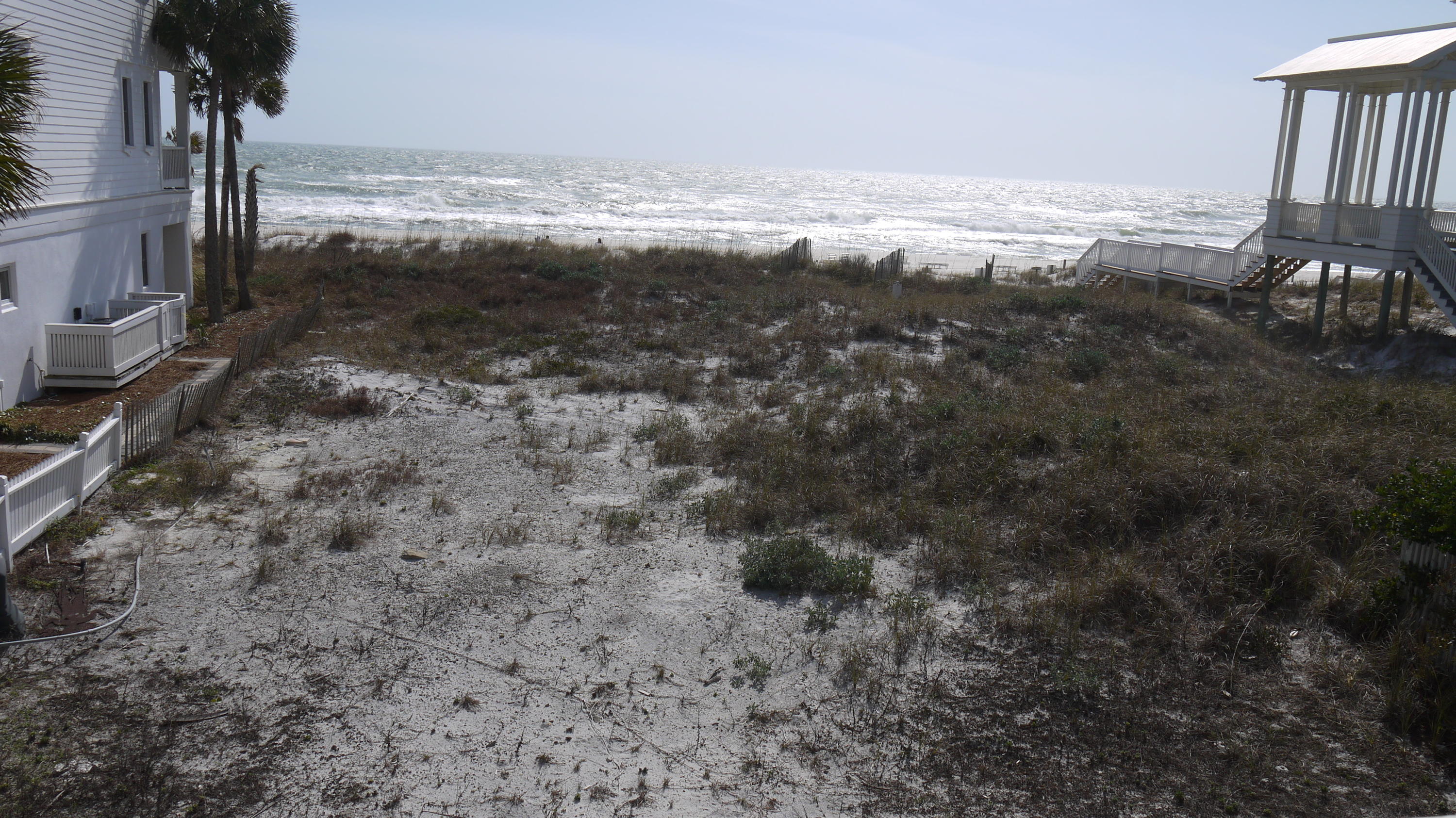 This 45' Gulf Front lot is located in the eastern portion of Carillon Beach, with a very private entry from a cul de sac off Beachside Drive. The spectacular views from this lot are breath taking. There is ample room on this lot to build a guest house or carriage house as well as a main house. There are very few Gulf Front lots remaining in Carillon Beach - this one is a beauty. Take the time to give us a call and come see this great piece of property. Imagine sitting on your porch, watching the dolphins play and having your own beach walkover!
