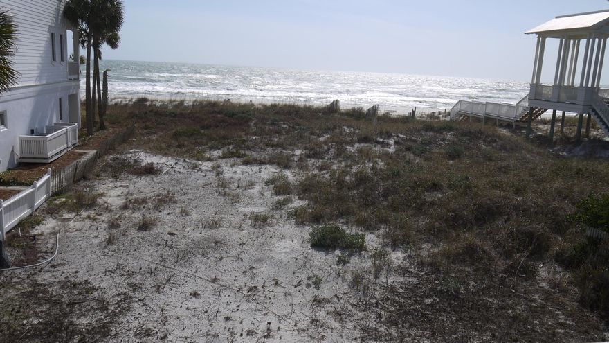 This 45' Gulf Front lot is located in the eastern portion of Carillon Beach, with a very private entry from a cul de sac off Beachside Drive. The spectacular views from this lot are breath taking. There is ample room on this lot to build a guest house or carriage house as well as a main house. There are very few Gulf Front lots remaining in Carillon Beach - this one is a beauty. Take the time to give us a call and come see this great piece of property. Imagine sitting on your porch, watching the dolphins play and having your own beach walkover!