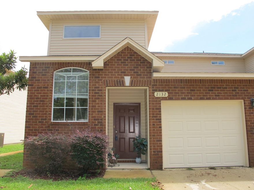 VA Compromise Sale with approved price! This Hadleigh Hills townhome is an end unit. Private setting backing up to trees, it's a short commute to Hurlburt Field and the beaches! Two story townhouse with expanded first floor living room, gorgeous open kitchen with breakfast bar, maple cabinets and stainless steel appliances. Striking entry with dramatic ceiling height to second floor. Three full baths. Some inside paint needed.