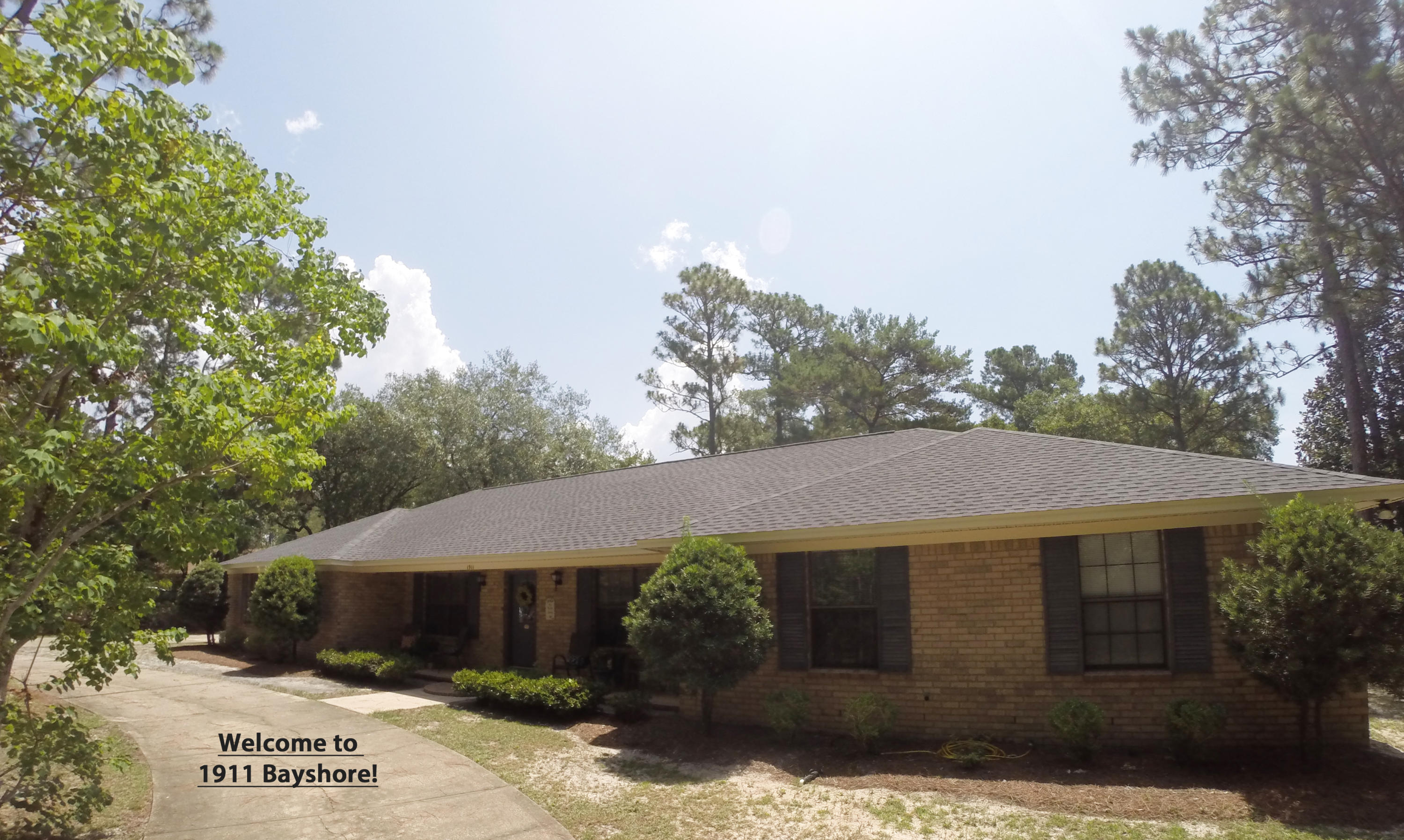 PRIVATE .75 acre property with lots of parking for your cars, RV or boat!!! NEW ROOF in June 2015! Lovely all brick home in a great central location - close to schools, shopping, and just a quick drive to the bases or the beaches! Fantastic layout (see floor plan pic) - 4 bedrooms, 3 baths, dining room PLUS a den/office. Lots of parking. Oversized 2-car garage. Marina, park, and boat launch just down the street. This is a great buy! Flood Zone X and Termite bond in place.