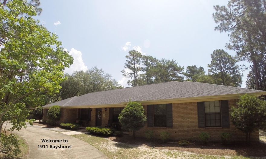 PRIVATE .75 acre property with lots of parking for your cars, RV or boat!!! NEW ROOF in June 2015! Lovely all brick home in a great central location - close to schools, shopping, and just a quick drive to the bases or the beaches! Fantastic layout (see floor plan pic) - 4 bedrooms, 3 baths, dining room PLUS a den/office. Lots of parking. Oversized 2-car garage. Marina, park, and boat launch just down the street. This is a great buy! Flood Zone X and Termite bond in place.