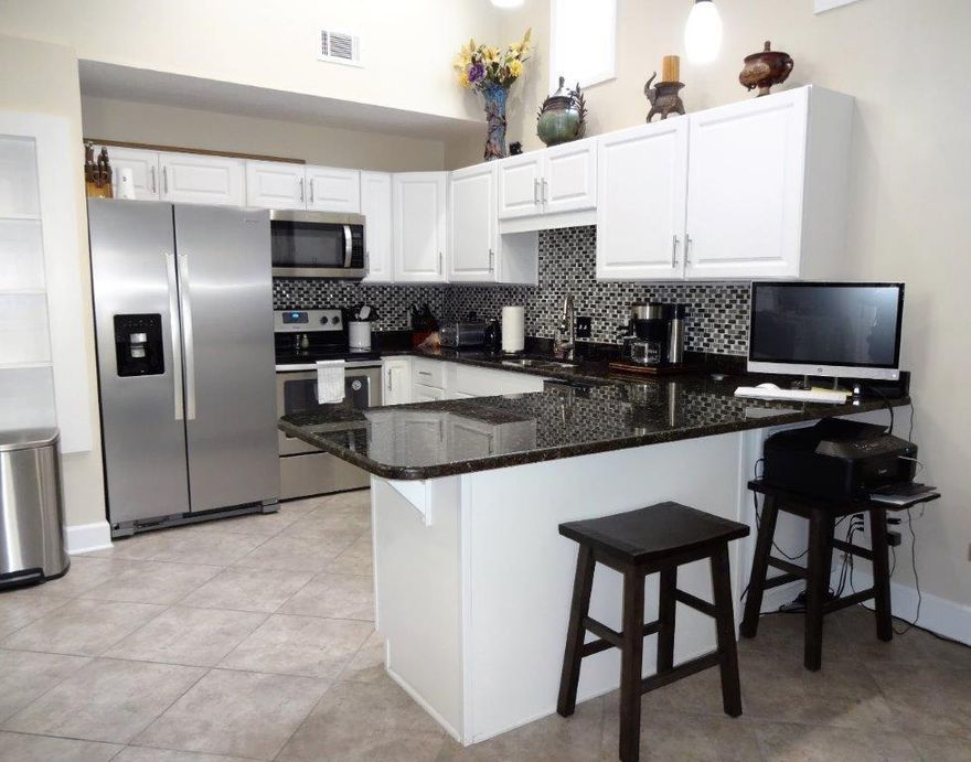 Adorable Remodeled 3 Bedroom home in the heart of Destin. Featuring: New Metal Roof (2016), Hurricane Impact Windows (2016), New Outside Storm Doors (2020), 1 Year Old Stainless Appliances, New Wood Flooring, Granite Countertops, Wood Burning Fireplace, New Bathroom -Sinks, Toilets, Mirrors (state of the art) Cabinets, New Doors, Hot Water Heater (2014) with super fast recovery, New Paint, Fenced in Back Yard with Separate Laundry Room (two entrances), Screened in Porch and Shed. This home is in great condition and every detail is well thought out. Open spaces with high ceilings, lots of natural light, french doors to the back porch, lots of storage, parking and a separate laundry room create a space you will love to call home.