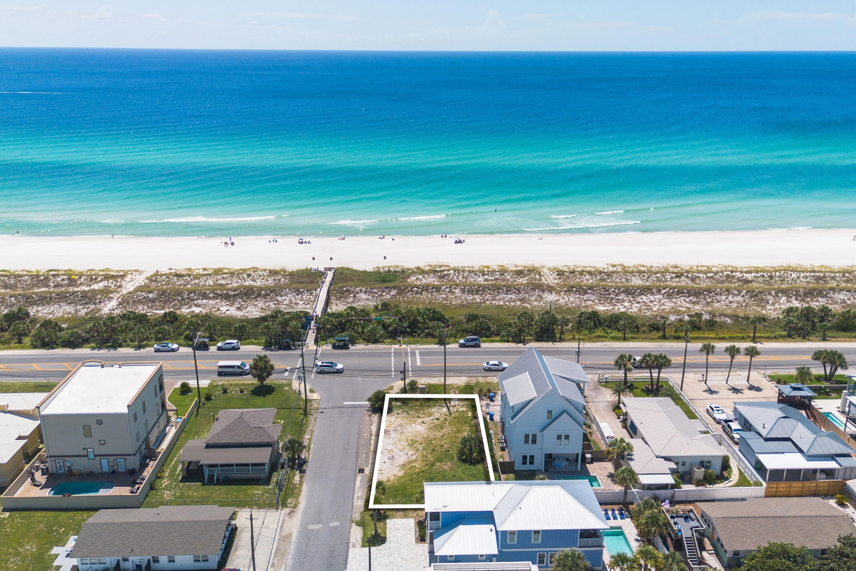 A RARE Opportunity to own a CORNER Lot with unobstructed Gulf Views in the heart of PCB. Welcome to 14,000 Front Beach Road. Nothing is more iconic and nostalgic than Bid-A-Wee Beach and Front Beach Road. Own a part of this history in a rare vacant lot on which to build the beach house of your dreams. Perfect for a primary, secondary, or investment property. Rental Income in this location is unmatched with Private Beach Access within steps. Corner lot is spacious with 60 feet of width and 100 feet of depth all with unobstructed Gulf Views at the corner of Front Beach and Argonaut. Lot has been cleared and filled and is ready for a vision to build a truly EPIC Beach Home. Don't miss the opportunity to own a piece of PCB nostalgia with a nod to the future as you make your dreams a reality!