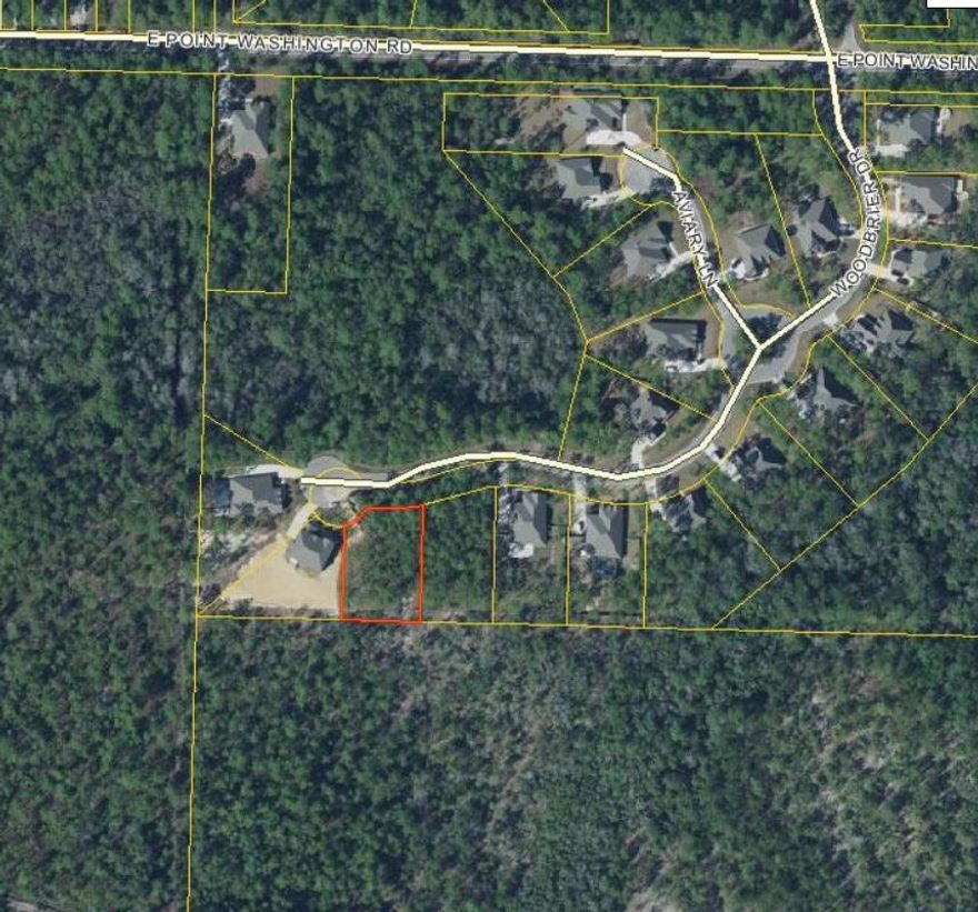 Beautiful half acre lot that's waiting to be developed for your dream home! The Woods is a nice and quiet neighborhood located in the picturesque Point Washington area. Placed in an area that promises serenity, it is still close enough to the beach to enjoy the best of both worlds.
