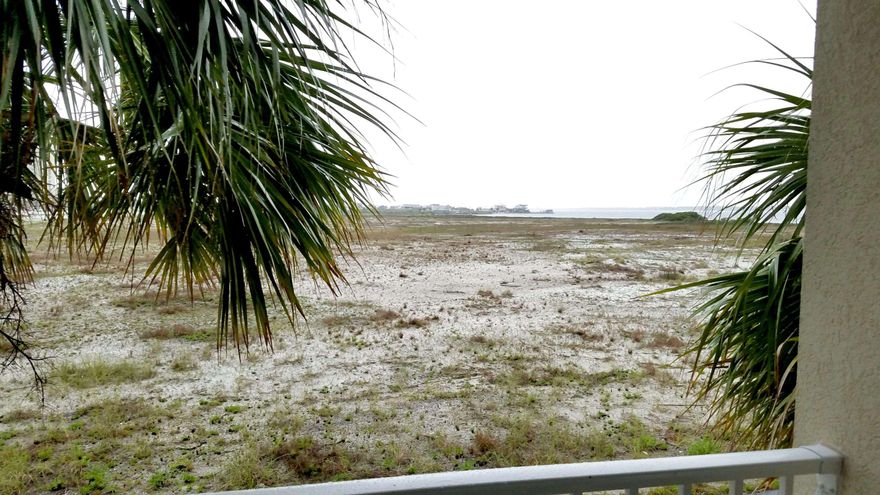 DEVELOPER UNIT !! Like new, completely renovated including granite kitchen counter tops w/undermount stainless steel sink, all new stainless steel appliances, new faux wood window blinds, new sliding glass door blind, new paint throughout. 1 bedroom with hallway bunk beds and 2 bathrooms. Beach access is directly south of community. Nice community pool with showers and restrooms. Association provides basic cable, trash and grilling area. FNB&T is interested in providing financing as is Beach Community Bank.