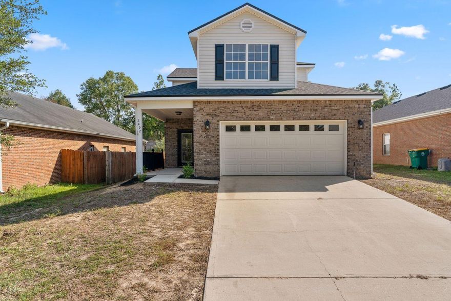 Welcome to your dream home in North Crestview! This spacious and beautifully updated 3-bedroom, 3.5-bathroom residence boasts nearly 2,500 square feet of living space on a generous .22-acre lot. With a freshly painted interior, new carpeting, and a host of other recent upgrades, this home is ready for you to move right in.  As you step into this  home, you'll immediately notice the fresh paint and new carpeting throughout, creating a welcoming and move-in-ready atmosphere. The spacious living area features a cathedral ceiling, providing a sense of openness and airiness. The kitchen boasts plenty of counter space for your culinary adventures.The newly screened back porch is a delightful spot to relax and unwind, offering bug-free outdoor enjoyment.