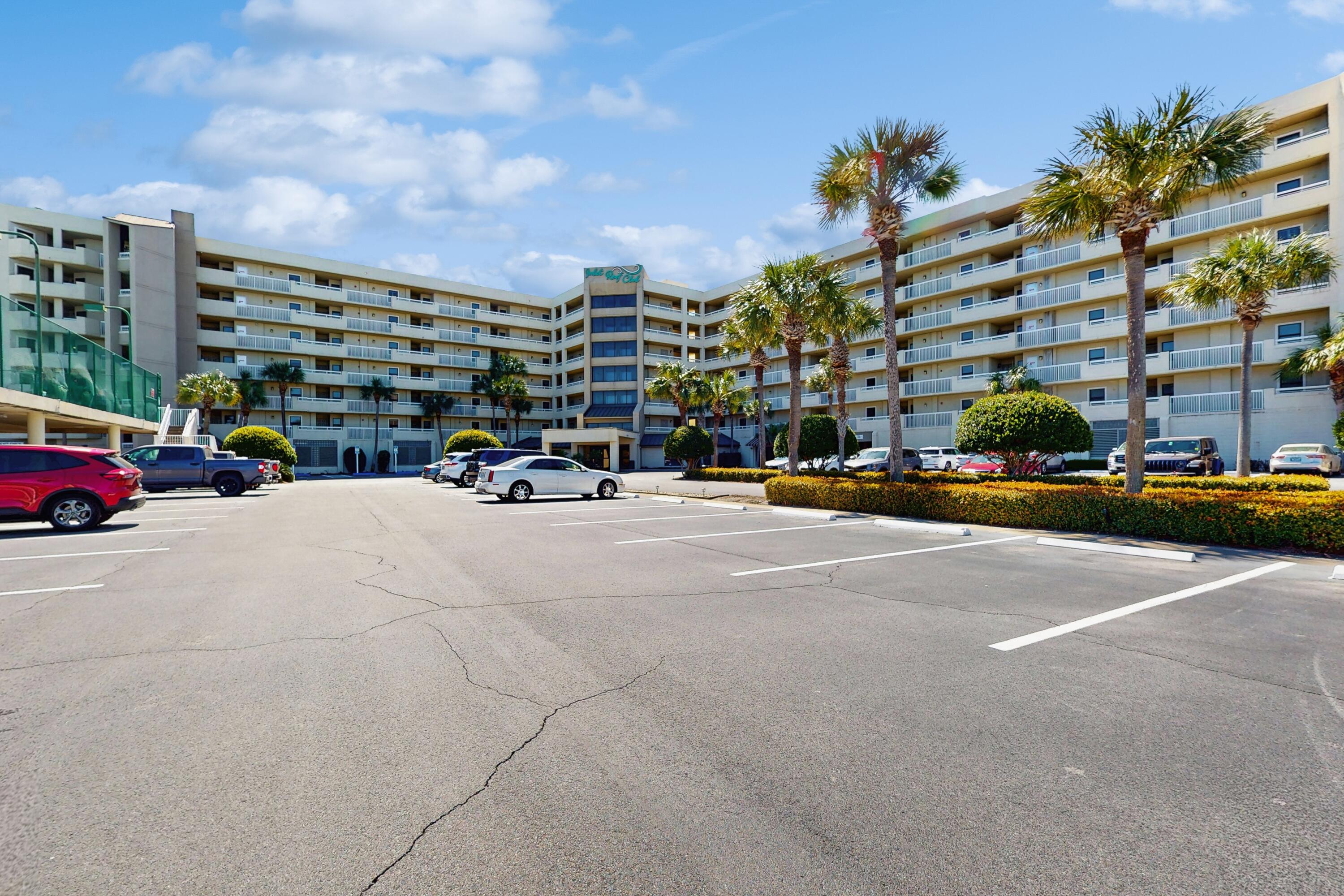 Enjoy your view of the gulf and the sound of the surf and monitor boat traffic in and out of the mouth of East Pass from this 5th floor large-size 2Br/2Ba beach condo beautifully finished and nicely furnished in light-and-bright natural tones. Note the room-size hexagonal balcony with 4-top dining table. Ask about creating a ''sleeping area'' at the laundry area at the back of the kitchen for a 3-bedroom effect. Explore the building's many amenities but especially consider the covered parking, and the large beach closet there at the covered parking. Boat? Ask about on-site parking for boat / boat trailer. Plan ahead to see this condo: This is a vacation rentals condo, so your real estate agent will need to call ahead to learn when it can be seen.