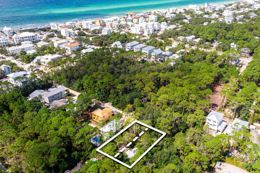 A beach house and a vacant lot Tucked Away just off 30A. This custom built beach cottage in the heart of Seagrove just a short stroll down the street to a neighborhood deeded beach access and use. This adorable two bedroom cottage/carriage home is built on the north west corner of double lot. (.31 acre, lots 23 & 24 in gulf shore manor). It is less than .25 miles to the beach with almost .25 of beach frontage for Gulf Shore Manor owner and guests. This property has ample room for a large main house and a pool.  The cottage is offered turn key and rental ready.  Interior details include built in dining booth with storage, hidden front loader washer and dryer, SMEG refrigerator, ice maker and gas range/hood.