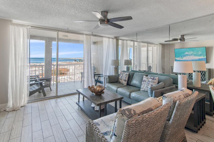 Discover a coastal haven like no other in the heart of Destin. This 4th-floor condo in Magnolia House offers breathtaking, panoramic views of the Gulf, Destin's East Pass, the bay, and the Harbor--where boats set out for a day of fishing and adventure.  Nestled within the unique, gated island community of Destin Pointe, this 2-bedroom, 2-bathroom condo is more than just a home; it's a gateway to a lifestyle that combines tranquility with adventure. With less than 200 home sites and 66 exclusive condos, Destin Pointe offers a rare, serene environment with over 3,000 feet of pristine water frontage. Unlike anywhere else in Destin, you can choose between the calm waters of the East Pass--perfect for snorkeling... on red flag days or the invigorating waves of the Gulf, all just steps from your door. The condo features a gulf-front primary bedroom and wood-look tile floors. The roomy lanai provides a perfect space for relaxing, enjoying the stunning views, or storing your beach essentials. Magnolia House, a boutique condominium within Destin Pointe, offers residents a variety of amenities, including tennis courts, pickleball, shuffleboard, and three community pools. Whether you're looking to unwind by the pool, explore the beaches, or soak in the breathtaking views of the pass, harbor, and coastal dune lake, this is your chance to experience the unparalleled beauty and lifestyle of Destin Pointe.
Come and see why Destin Pointe is a hidden gem, a community that perfectly blends the beauty of the Emerald Coast with a sense of peace and exclusivity that's simply unmatched.