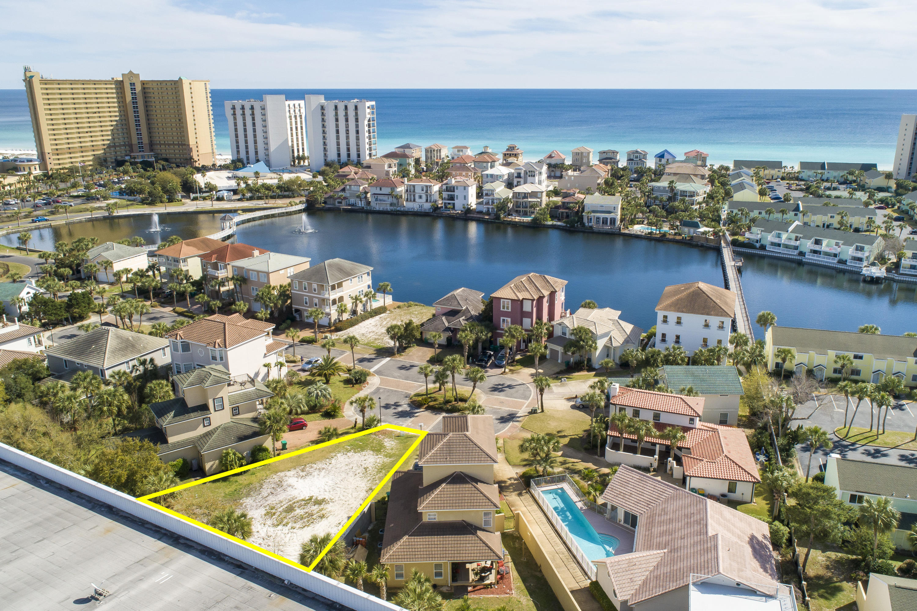 BACK ON MARKET. Now your chance to own this rare Large lot ready for your Vacation Rental Residence, Family or Second home or hold for investment. Deeded beach access, very desirable community location, with excellent rental income producing neighbors.This is the lowest price lot in Destin that has proper zoning for short term vacation rentals & neighborhood amenities including beach access.