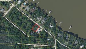 This large beautiful lot should offer good views of the Choctawhatchee Bay. Located on a quiet street in Santa Rosa Beach this home site is just minutes away from the white sandy beaches of 30-A as well as local restaurants and shopping. Two boat ramps are very close by as well. Please call today for more information.