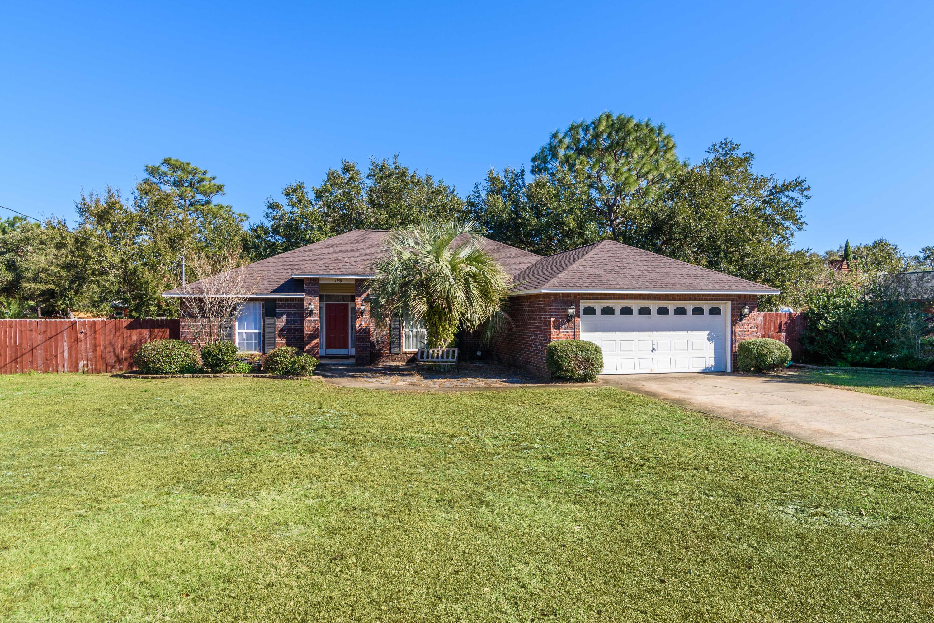 Look no further!! 3 bedroom 2 bath over 2000 sqft home in Holley By The Sea, Brick home with an enclosed back porch and a large screen patio. New roof and AC installed 2020! The open floor plan is very spacious with cathedral ceilings in the living area to make it feel even larger. There is wood laminate flooring in the living room, tile flooring in kitchen and carpet in 2 of the bedrooms with one room having LVP flooring. The kitchen has nice wood cabinets with black granite countertops and stainless appliances. The master bedroom is oversized for a king bed and enough room for a office desk if needed. The master bathroom has a double vanity, stand alone shower, and separate garden tub for relaxing, large walk in closet. The back yard was designed for relaxing and working in the garden.
