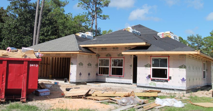 Brand new construction started on 6/15/16. Still time to choose colors, flooring and lighting. Awesome floor plan by multiple award winning builder and past Parade of Homes winner! This 4/2 custom brick home has super curb appeal. There are 10 ft. ceilings w/ impressive crown molding, tile flooring, and 5 1/4'' baseboard throughout the main living areas. As you approach the front of the home, you will be quite impressed. The covered porch is very welcoming, and the 8 ft. leaded glass door, makes for a grand entrance. The formal dining room is at the left of the home's front. You will then enter the chef's delight kitchen will which boast maple cabinetry, granite countertops, a huge pantry, a storage closet, and stainless appliances (including an oversized