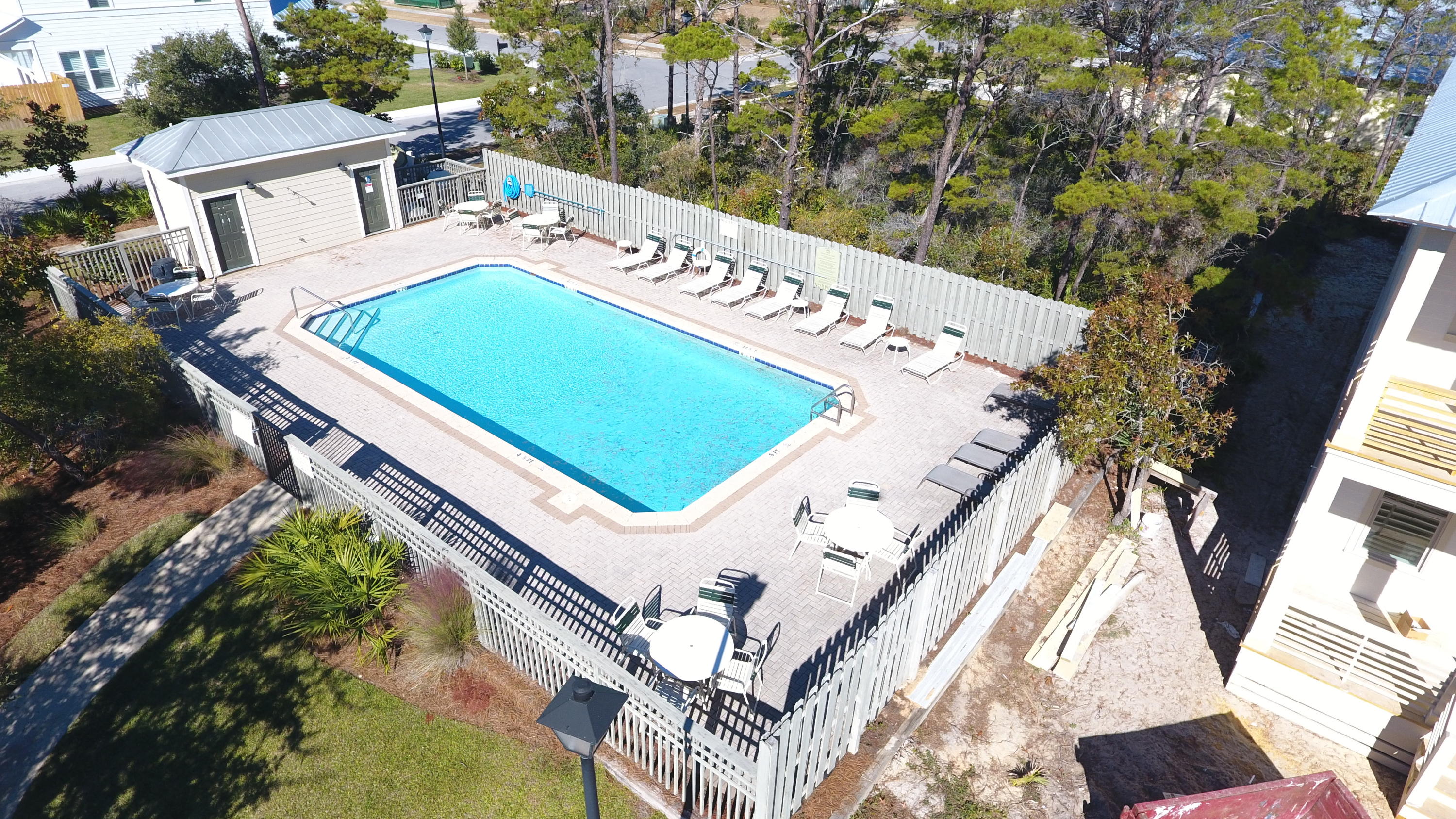 Lot in a small private community with pool. Nice wooded with lots of Privacy. The community features Sidewalks, Street Lights and a Pool. Gulf Place with its shops and restaurants is just .3 miles away making this lot the perfect lot for your beach home.