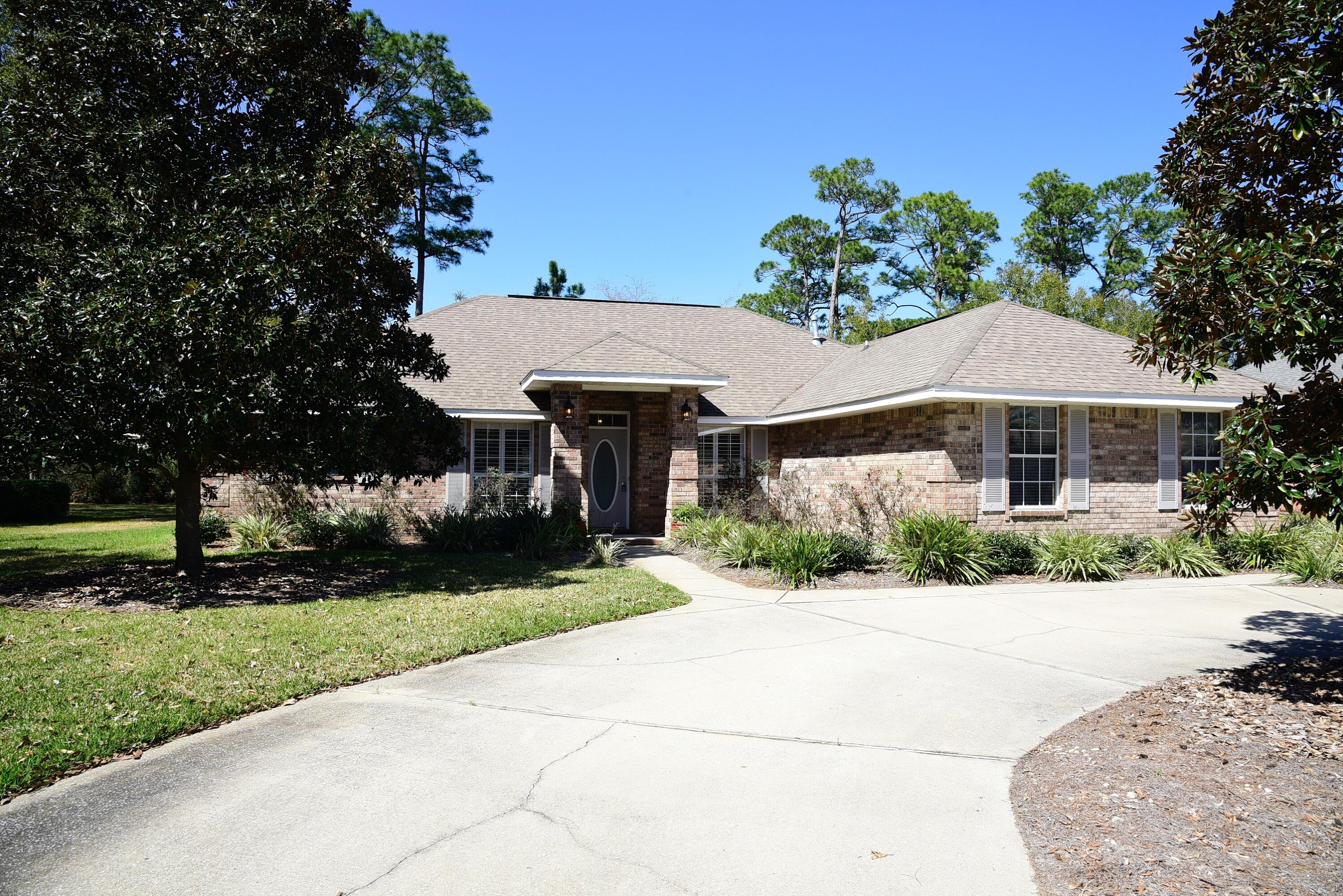 Welcome to this beautifully maintained home in Bluewater Bay! This charming house features 3 bedrooms and 2 bathrooms, perfect for those looking for a cozy yet modern living space. The kitchen boasts stainless steel appliances and granite countertops, ideal for cooking and entertaining. The open floor plan allows for seamless flow between the kitchen, dining, and living areas. Step outside to the screened patio, where you can enjoy the fresh air and relax in the privacy of your own backyard. Located at the end of a cul de sac in the gated community of Magnolia Plantation, this home is perfect for those seeking a stylish and comfortable living environment. Call to schedule your showing today!