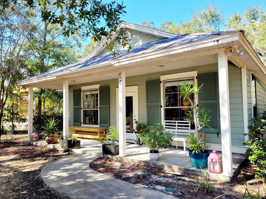 Nestled in the charming and historic community of Point Washington--one of Walton County's oldest settlements--this property offers the perfect blend of space, versatility, and location. Just minutes north of Seaside and WaterColor and less than a mile from the public boat launch on Choctawhatchee Bay at the end of Hwy 395, it's an ideal spot for boaters, beach lovers, and those seeking a peaceful, pedestrian-friendly neighborhood. Towering native trees, a circular driveway, and ample room for a pool or manicured lawn create a serene, park-like setting. The single-story main home features a smart, no-wasted-space floor plan with open kitchen, living, and dining areas, generous bedrooms, abundant storage, and a large laundry room. The spacious garage with extended ceiling and garage door heights, and a depth of 31', is perfect for housing multiple vehicles, water crafts, and recreational vehicles. Additional locked storage in the rear of the garage allows future owners the space for a safe room or to be used as an owner's closet while renters occupy the space.

Privately situated above the garage is a full one bedroom apartment, with a private entrance from the exterior, as well as garage access, you'll find a welcoming foyer that leads to the stairs of this lovely home in the trees. Windows line the main living space, flooding everything in natural light. Guests and owners can enjoy a comfortable stay with a full kitchen and large bathroom with space for a stacked washer/dryer hook up in place. 

With no HOA and both short- and long-term rentals permitted, there is income potential to earn from one or both residences, or enjoy multi-generational living. 

Morning bike rides to Eden Gardens State Park, afternoons on the bay, and quick trips to the sugar-white sands of 30A makes Point Washington the destination for those looking to enjoy that Old Florida ambiance. Surrounded by preserved forest land, you'll appreciate the natural beauty, lower traffic, and timeless charm of this coveted location. Call your agent today and move to where the locals love to live.