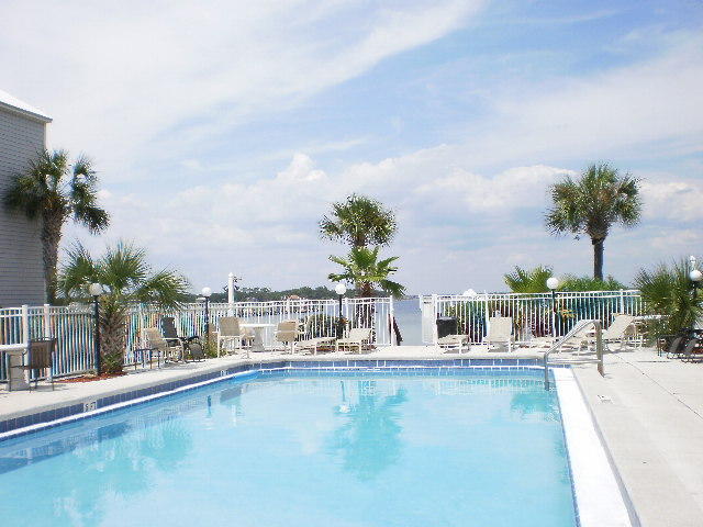 Freshly painted, upgrades and new flooring. This two bedroom water view condo includes a washer and dryer. It is close to everything - beach, pool, bay, restaurants, and it's a full time year round rental. Pets are not allowed for tenants, sorry. No smoking allowed. Now vacant.