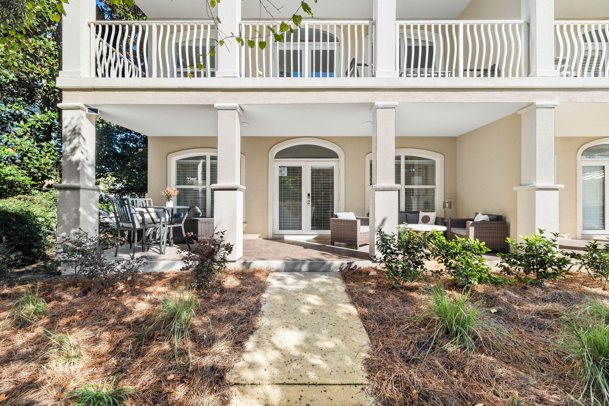 Welcome to this stunning first-floor, walk-out condo in the Villas at Seagrove, offering 2,124 sq. ft. of beautifully designed living space plus a spacious 160 sq. ft. covered porch! This open-concept, 3-bedroom beachside retreat combines convenience with refined coastal elegance. The gourmet kitchen features exquisite granite countertops and top-of-the-line stainless steel appliances, setting the stage for effortless entertaining. The interior is styled with clean, contemporary decor and charming details like the shiplap fireplace and refreshed doors and trim. Each bedroom offers plenty of space for guests, while the luxurious master suite includes a king-sized bed, a large walk-in closet, and a master bath with dual vanities and a whirlpool tubideal for relaxing a day along 30A.

Step outside onto your generous covered porch for year-round enjoyment, or take advantage of the walk-out access to the lushly landscaped grounds. With the deeded beach access and heated pool just steps away, this condo is your personal paradise by the sea!