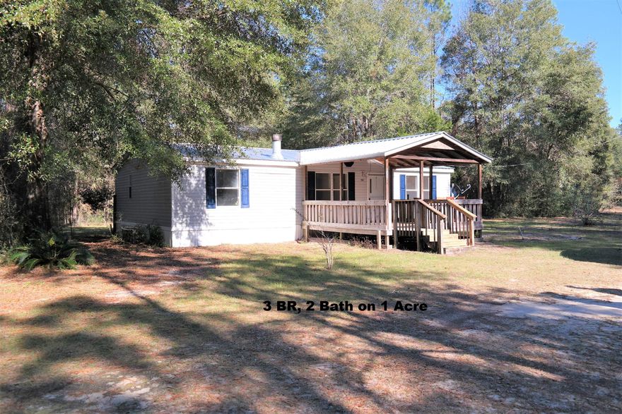 Great opportunity for an affordable home on 1 acre just minutes to downtown Defuniak Springs. This 1188 SF, 3 BR, 2 bath manufactured home has fireplace, laundry room, split floor plan; Master bath has whirlpool tub, double vanities and separate shower; New metal roof installed Sept. 2019. 14x16 covered front porch. Located in Eucheeana Valley, this property is centrally located to Panama City Beach and the Beaches of S Walton (within 45 minutes to each). Schedule your showing today!