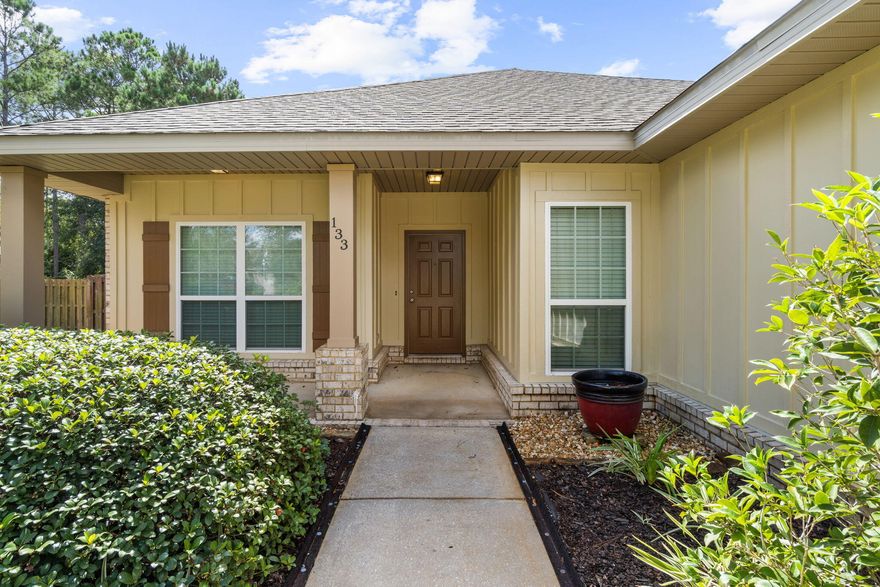 Ready for Occupancy! Tile flooring throughout w/new carpet in the 4 bdrs and flex room. A split floor plan provides ample privacy w/the master bdr overlooking the backyard and preserve.  The flex room has glass French doors - ideal for an office or dining rm. This spacious, open plan has high double tray ceilings in the family room. The kitchen is well equipped w/stainless appliances, granite counters and tile backsplash. A LARGE 14X16 covered porch and a custom brick paver fire pit looks out over the wooded preserve. Privacy fencing is in place and encloses this large lot.Monthly HOA fees INCLUDE: Basic TV Cable, Access to all pools, 24hour gym, Clubhouse, Movie Theatre, Tennis and Basketball,/Pickleball Courts, Playground, Bay Club