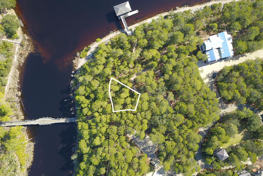 This charming neighborhood offers beautiful views, quaint homes and plenty of outdoor activities for all residents. Build your dream house on a lakefront lot in this exclusive area along 30A. This site is adjacent to green space offering substantial privacy and nice views of the lake.This site is also close to the western boat house for convenience for paddle board or kayak. Located in the private gated community of Draper Lake Coastal Village, this neighborhood offers not one  but two community pools, an observation tower, boat house with canoes and kayaks and golf carts for a smooth commute to the Gulf of Mexico.