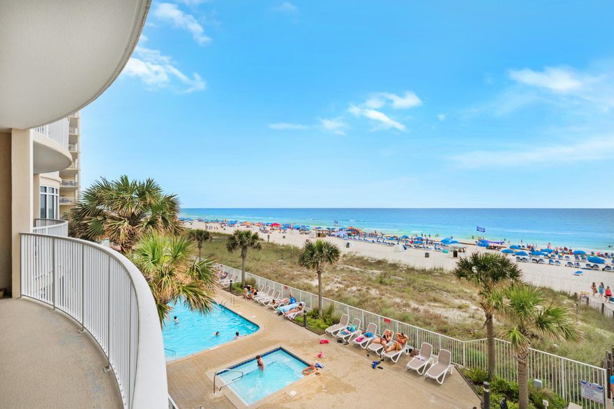 Welcome Home! This spacious and stunning GULF FRONT, CORNER CONDO unit features a RARE extra large private balcony. Take in endless and mesmerizing emerald water views for a lifetime. Your friends, family and vacationing guests will NEVER want to leave. This beautiful 2-bedroom 2 bath condo located in the exclusive complex of Ocean Villa.   Unwind in the master bedroom which features a private balcony access, gulf views, and a goergeous en suite. The guest bedroom offers a twin over full bunk bed with a twin trundle. A queen and twin sleeper sofa in the living room. New Furniture, New Floors + so much more! Located in the Heart of PCB, Ocean Villa boasts 2 swimming pools (outdoor pool and seasonally heated indoor pool), an oversized hot tub, grilling area, and exercise room with sauna!