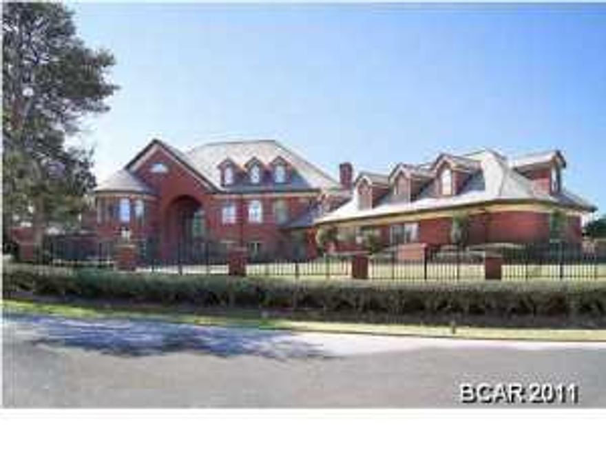 ''This Estate Home is being sold via a Live Auction to be held on Thursday, December 5, 2019. The List Price is the Minimum Bid Price at the Auction plus a 10% Buyer's Premium.''. Situated on 1.6 acres in the Preserve on the Bay. Most prestigious address in Bay County. Ultimate Security (9 foot electronic gates within the gated community) 90 zone security system with 13 Streaming and recorded video cameras. 11'2 ceilings through the home. The Grand Entrance is custom glass inlaid with brass casing. Imported and hand crafted Brazilian Mahogany. 3 cm solid marble tread and stairs. Over $550,000 in custom wood trim and cabinetry. A music room with soaring ceilings. A Ballet Room, sunken living room with couffered ceiling and alabaster lighting. Tennis Court, Swimming Pool, hot tub, and four