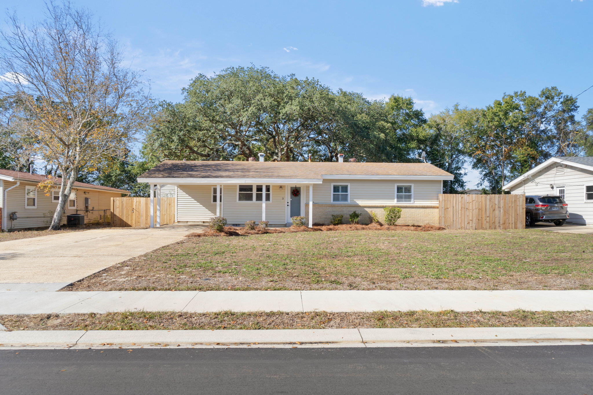 2.5% VA Assumable Loan! Amazing location-2 miles to Hurlburt Field, minutes to the boat ramp, and 1 mile from Target! This home is packed with value and sits on a gorgeous, flat lot with gorgeous mature oak trees, storage shed on concrete slab, and a *new* privacy fence. The extended driveway and carport offer up ample room for vehicles or boat trailer parking (no HOA to contend with here!) Mary Esther Dr was just recently repaved and is lined with sidewalks. Carpet free interior has been refreshed to include LVP flooring and fresh paint. *New Roof* being installed late December. Grab your beach gear and prepare yourself to experience Florida living at an affordable price!